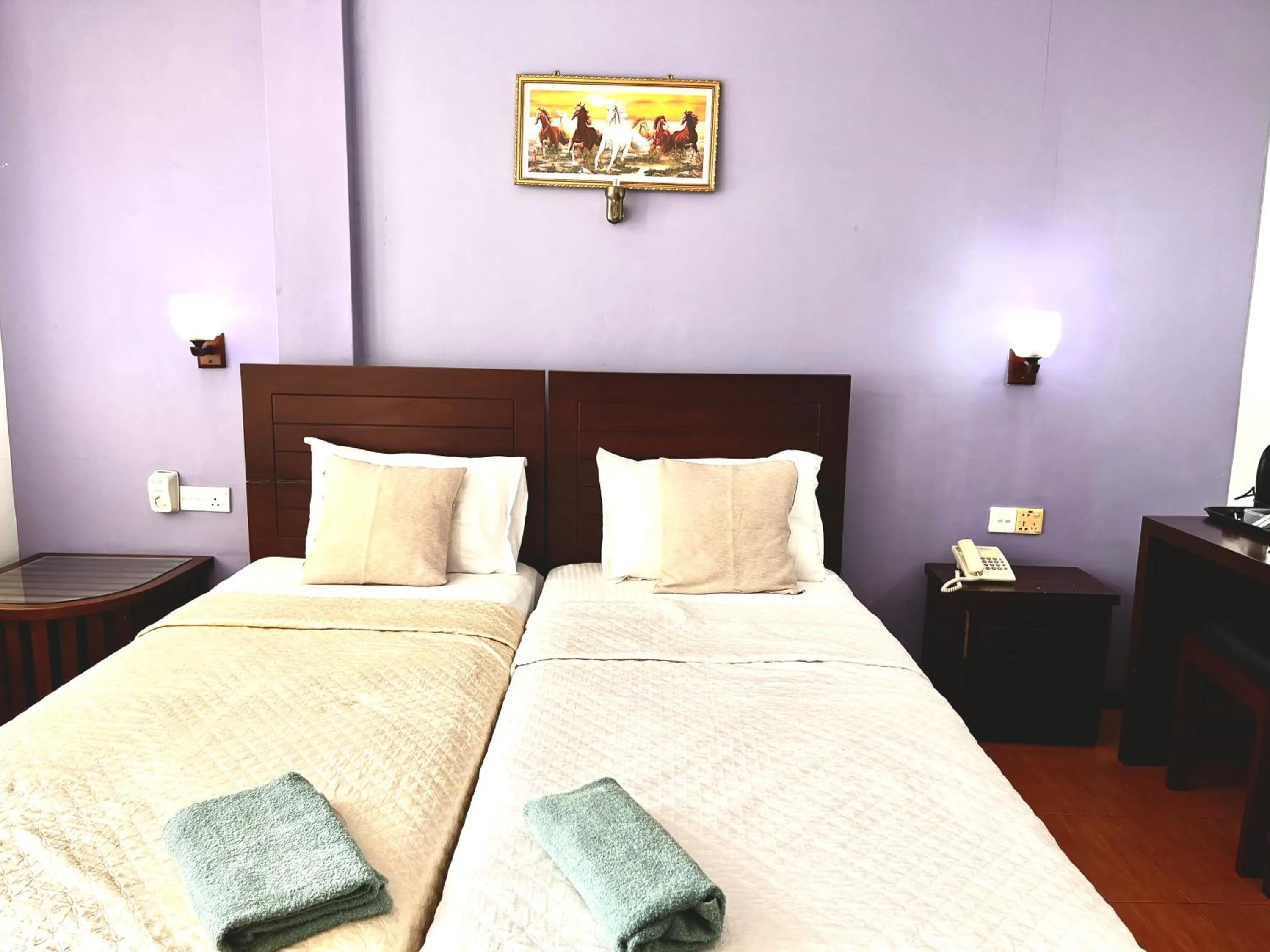 Bed in Subhas Tourist Hotel