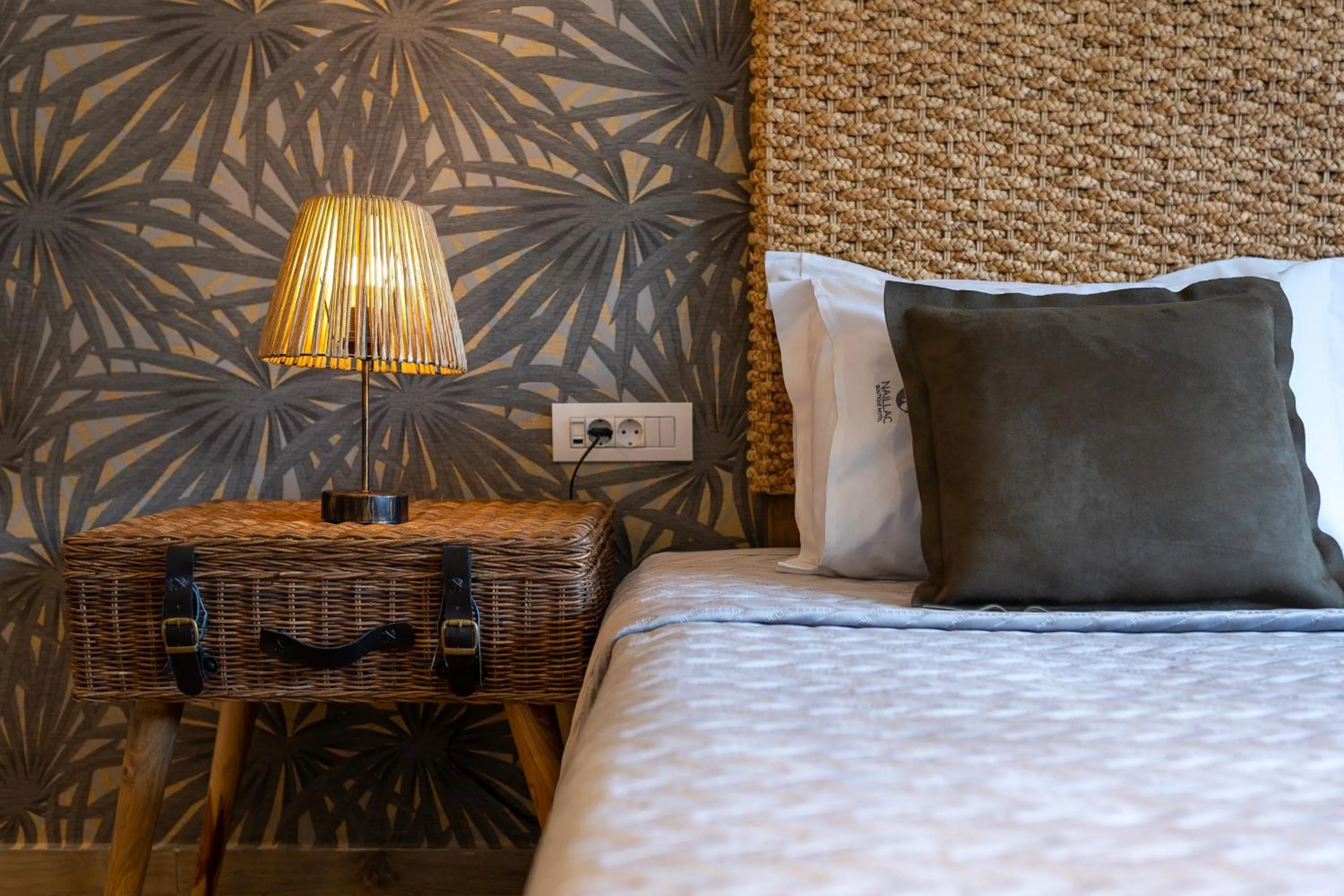 Bed in Naillac Boutique Hotel