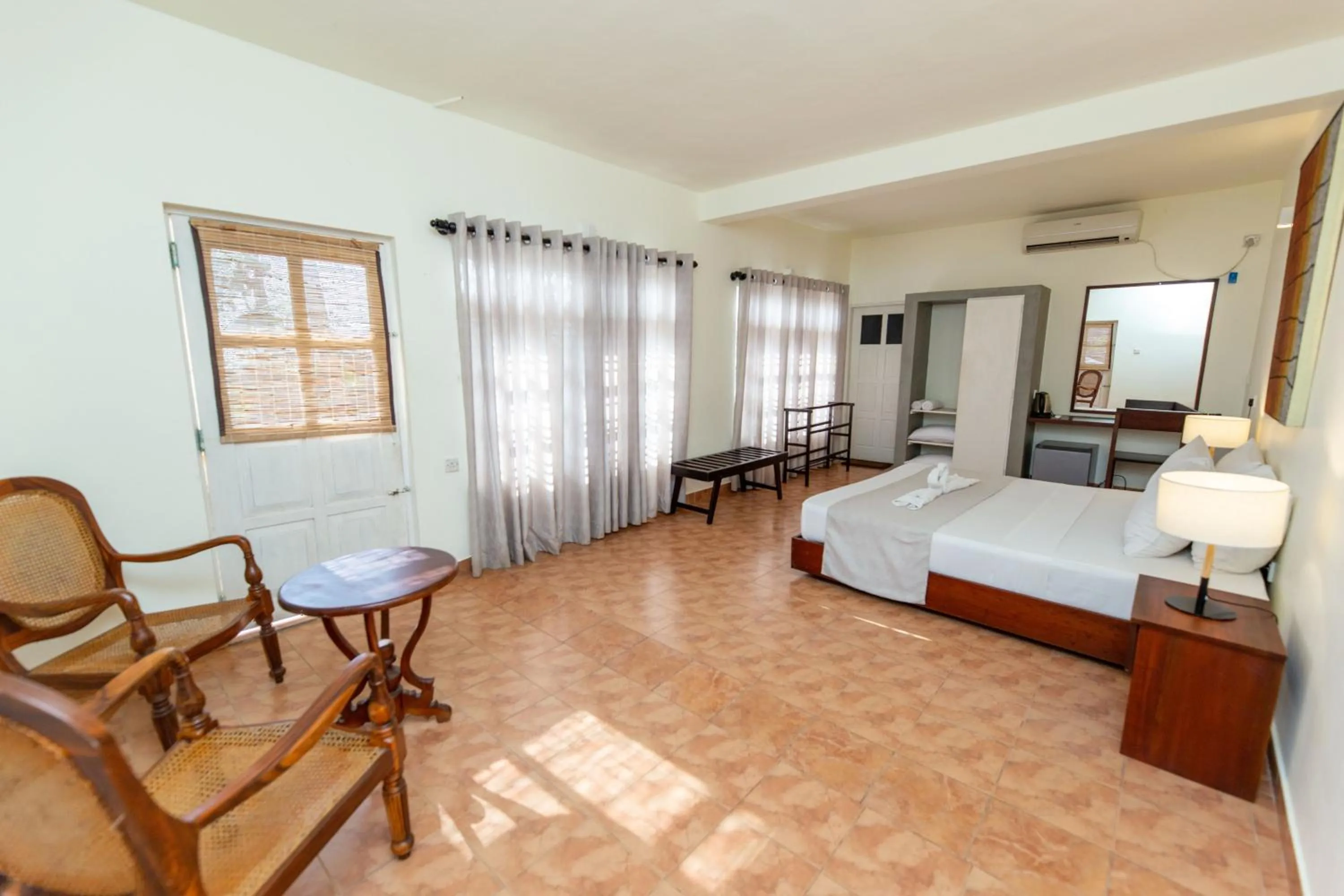 Photo of the whole room, Bed in Shangrela Beach Resort by ARK