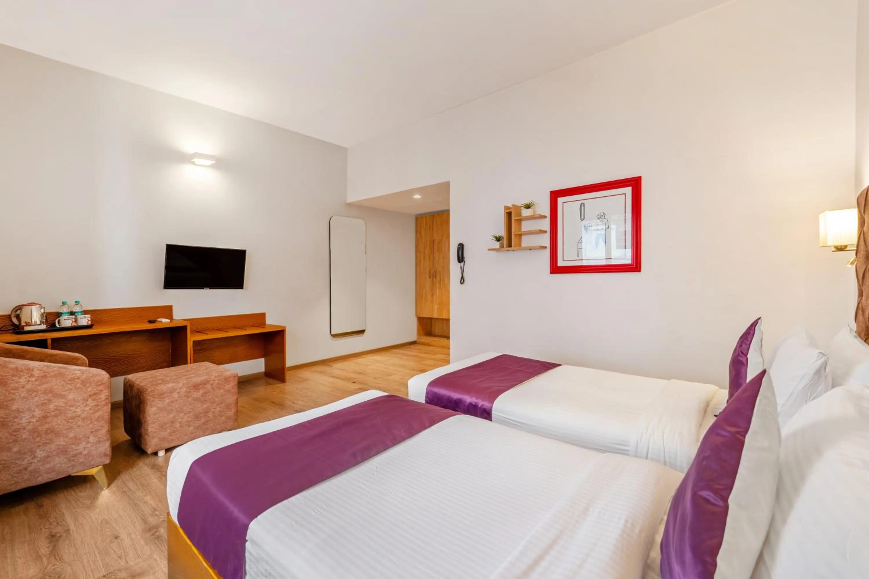 Bedroom in Monday Hotels Hitec City