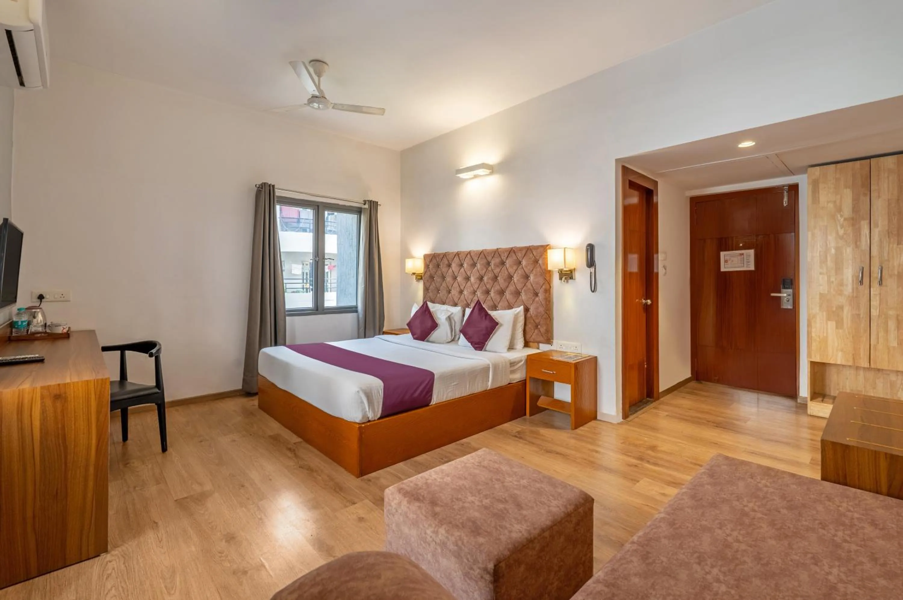 Bedroom in Monday Hotels Hitec City