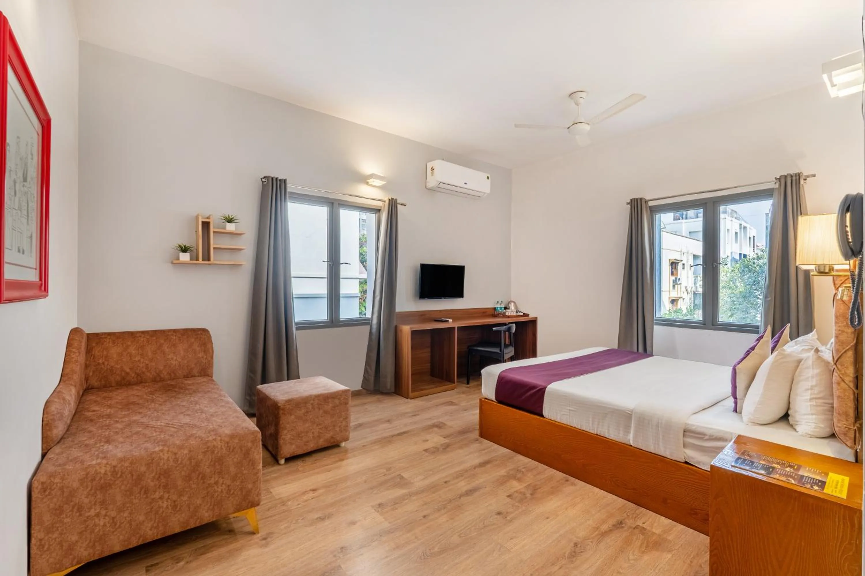 Bedroom in Monday Hotels Hitec City