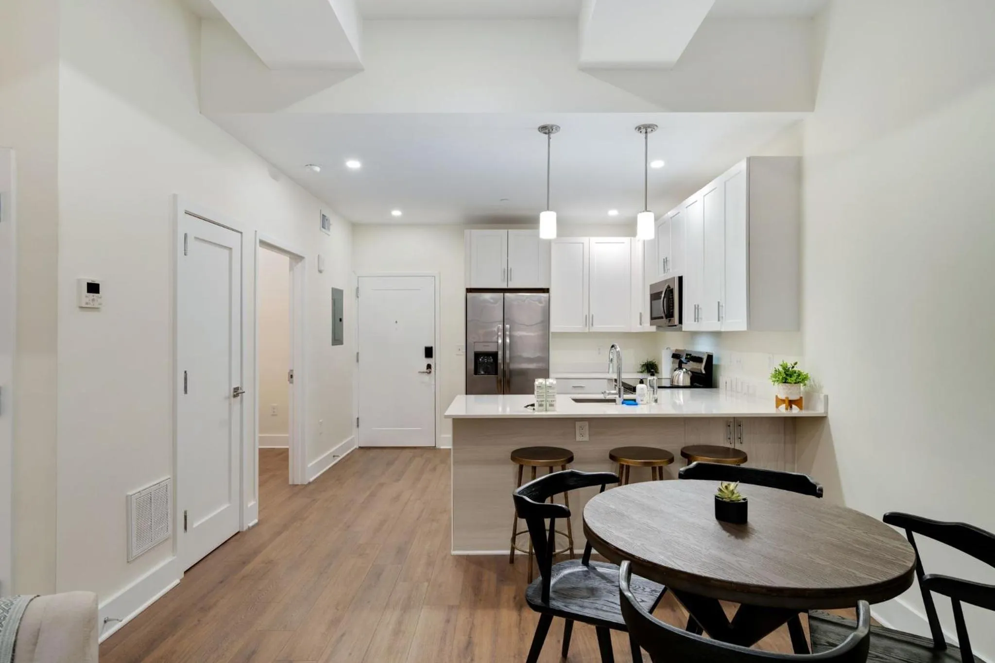 Kitchen or kitchenette in The Ledger Residences by Sosuite - Old City
