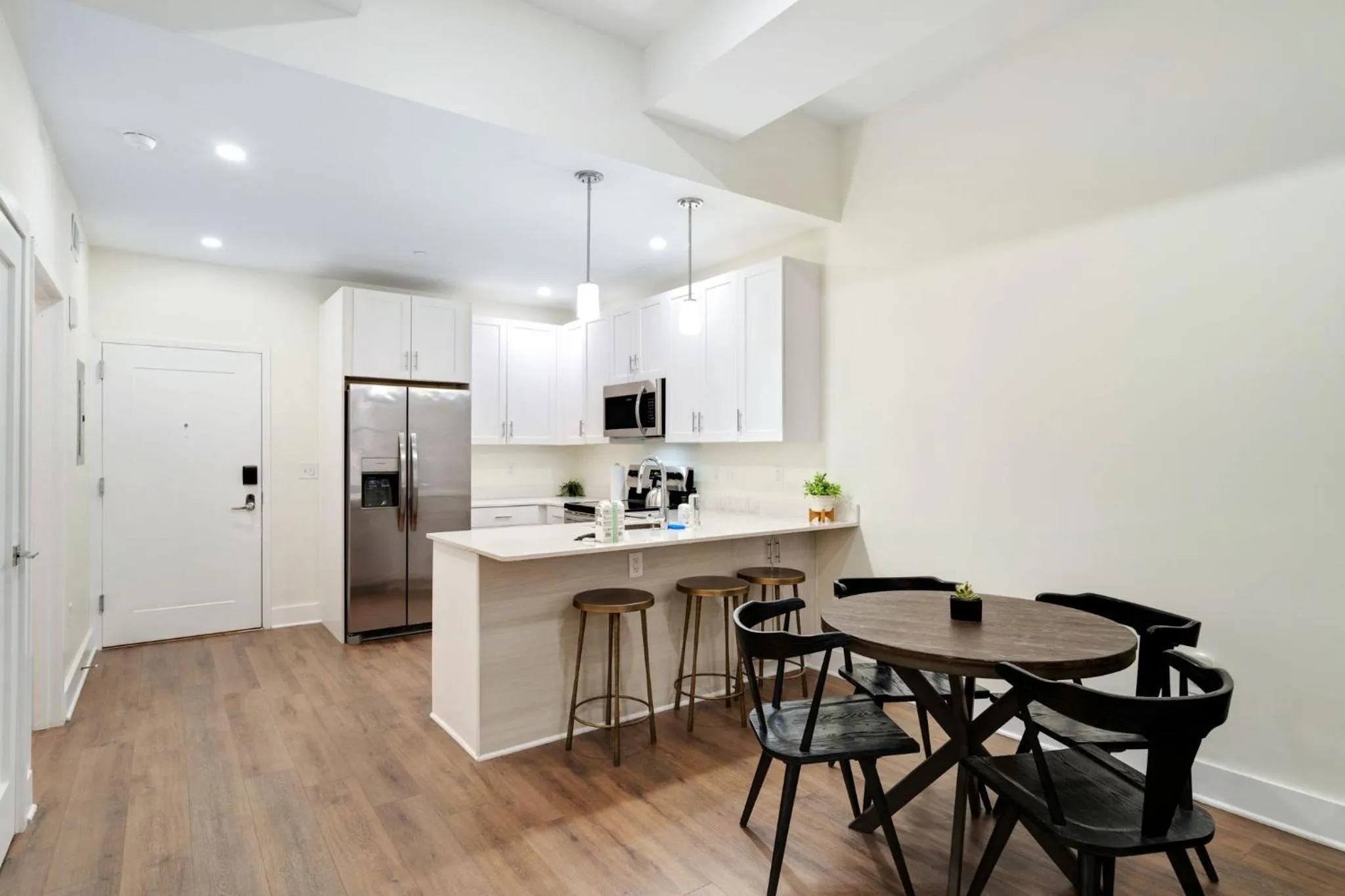 Kitchen or kitchenette in The Ledger Residences by Sosuite - Old City
