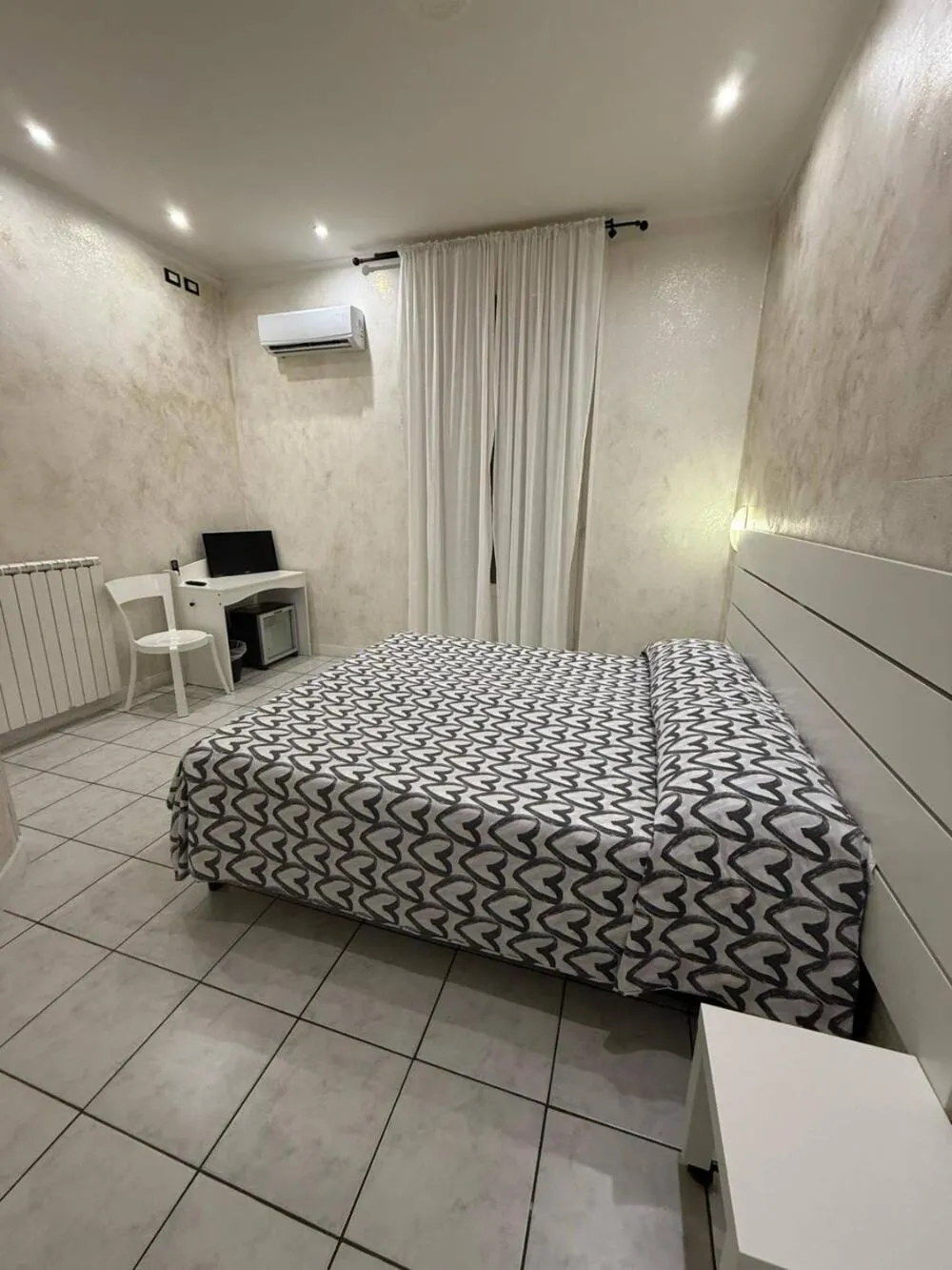 Bed in Pollon Inn Sanremo