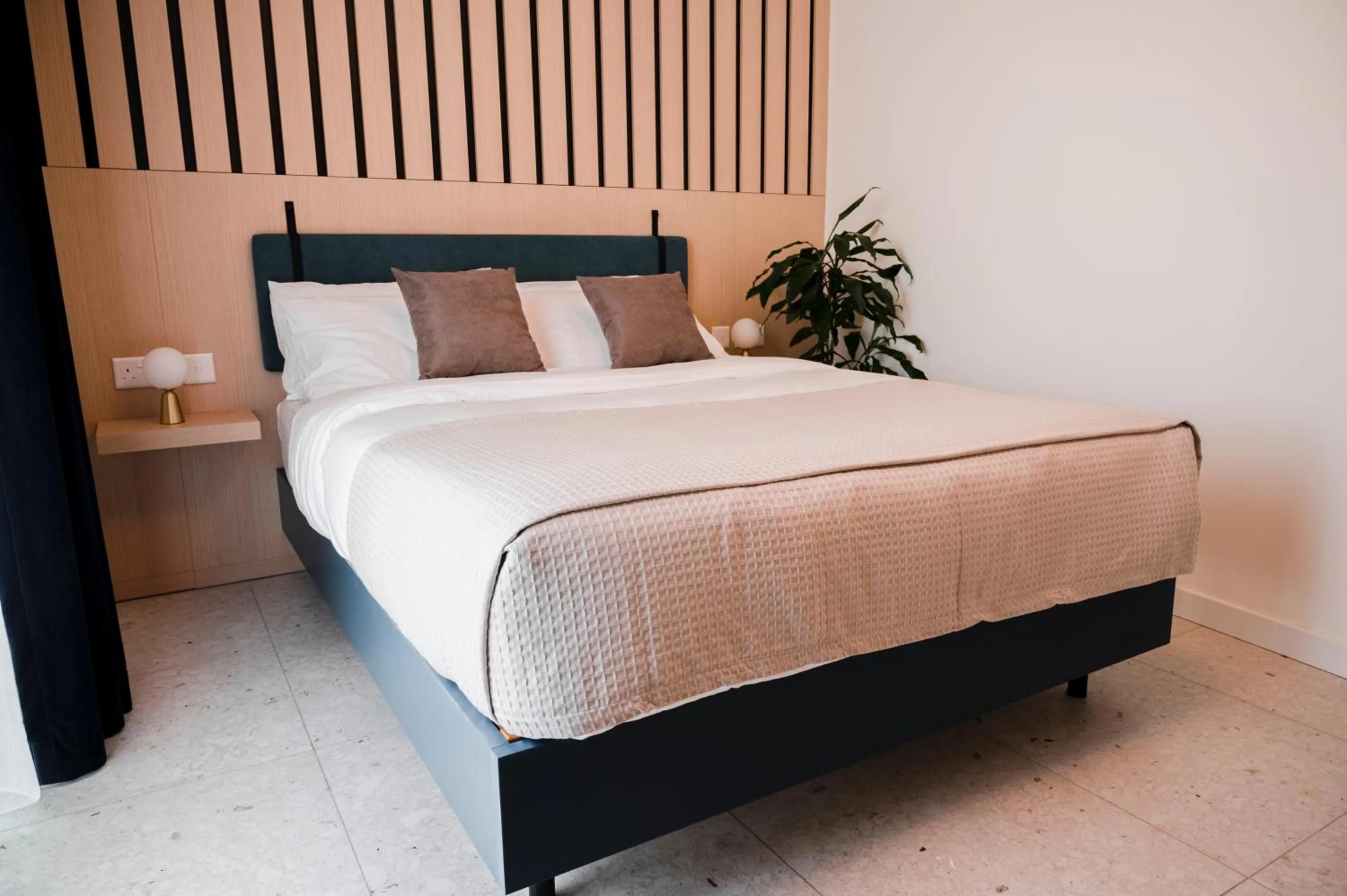 Bed in Townhouse17 Boutique Bed & Breakfast