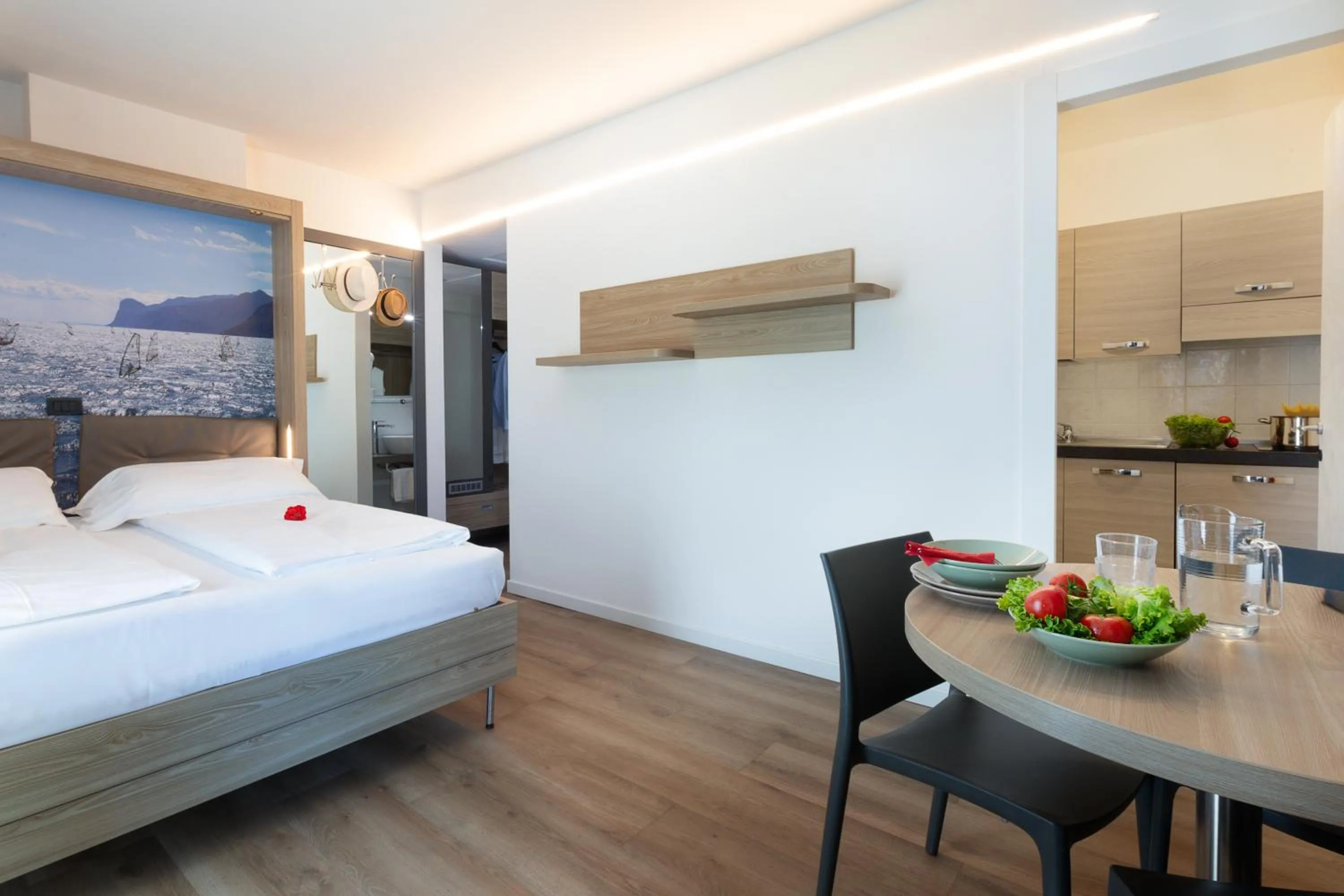 Bed in Ambassador Suite Hotel