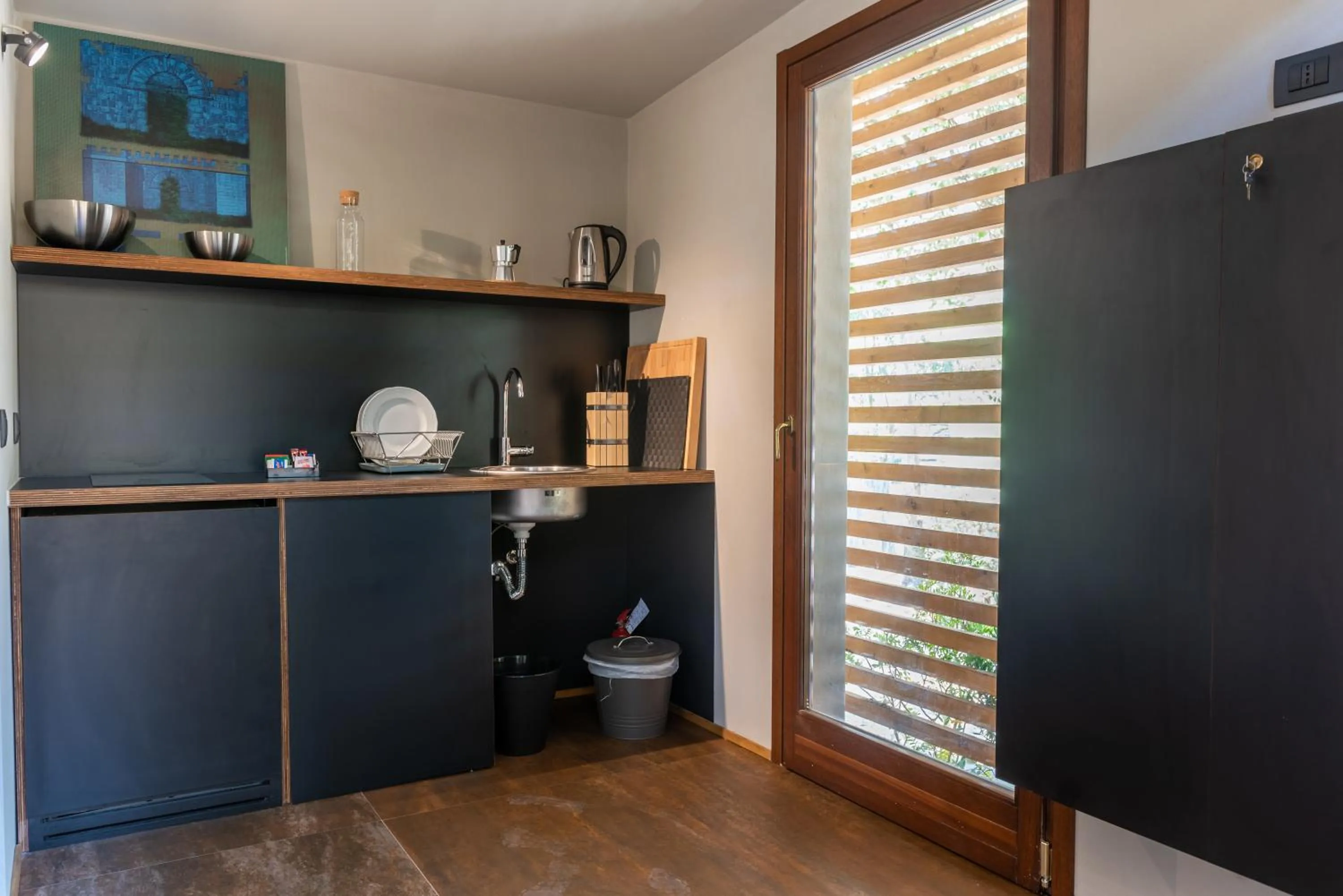 Kitchen or kitchenette in Camping Village Santapomata