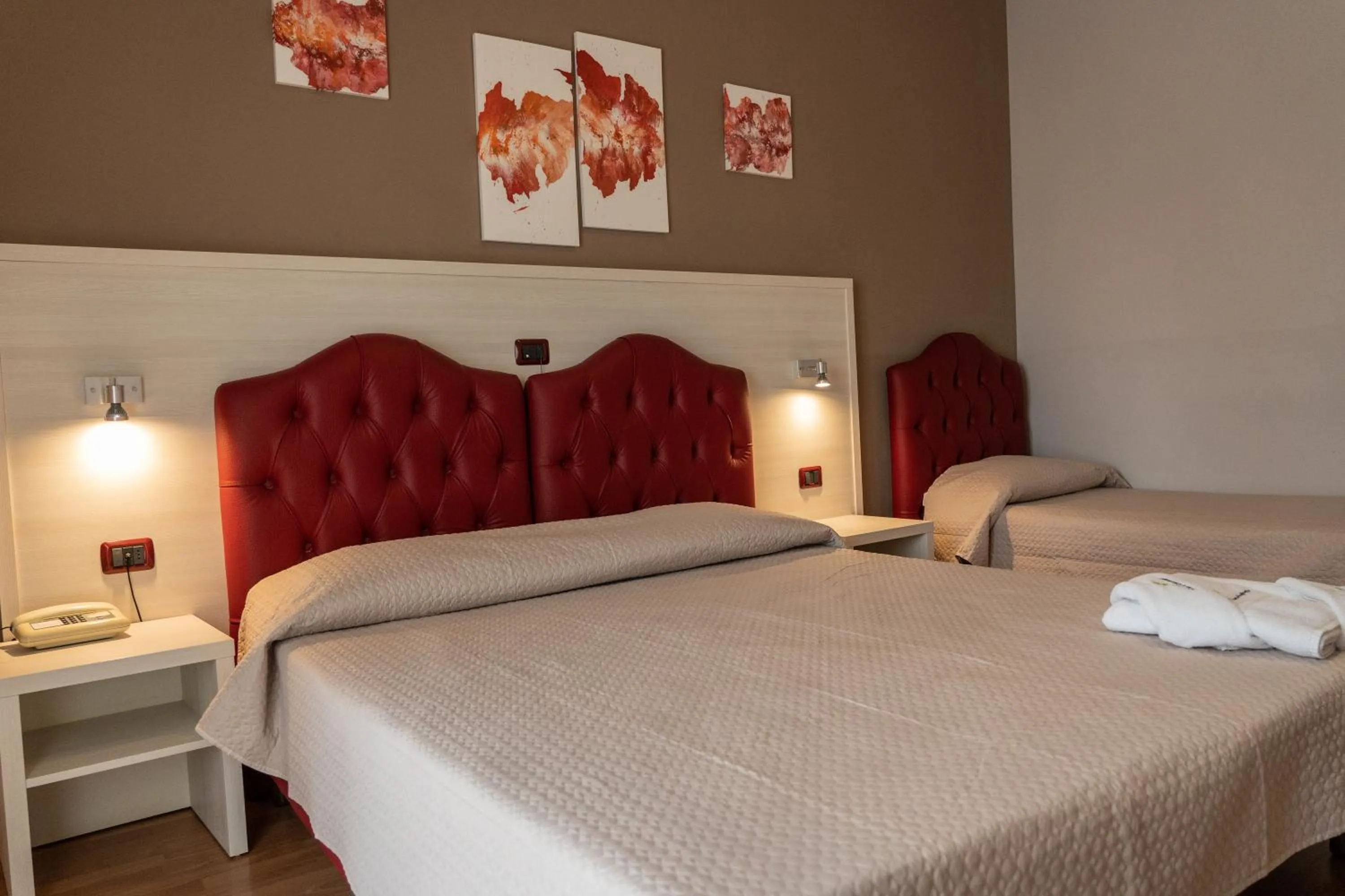 Bed in Hotel Il Quadrifoglio