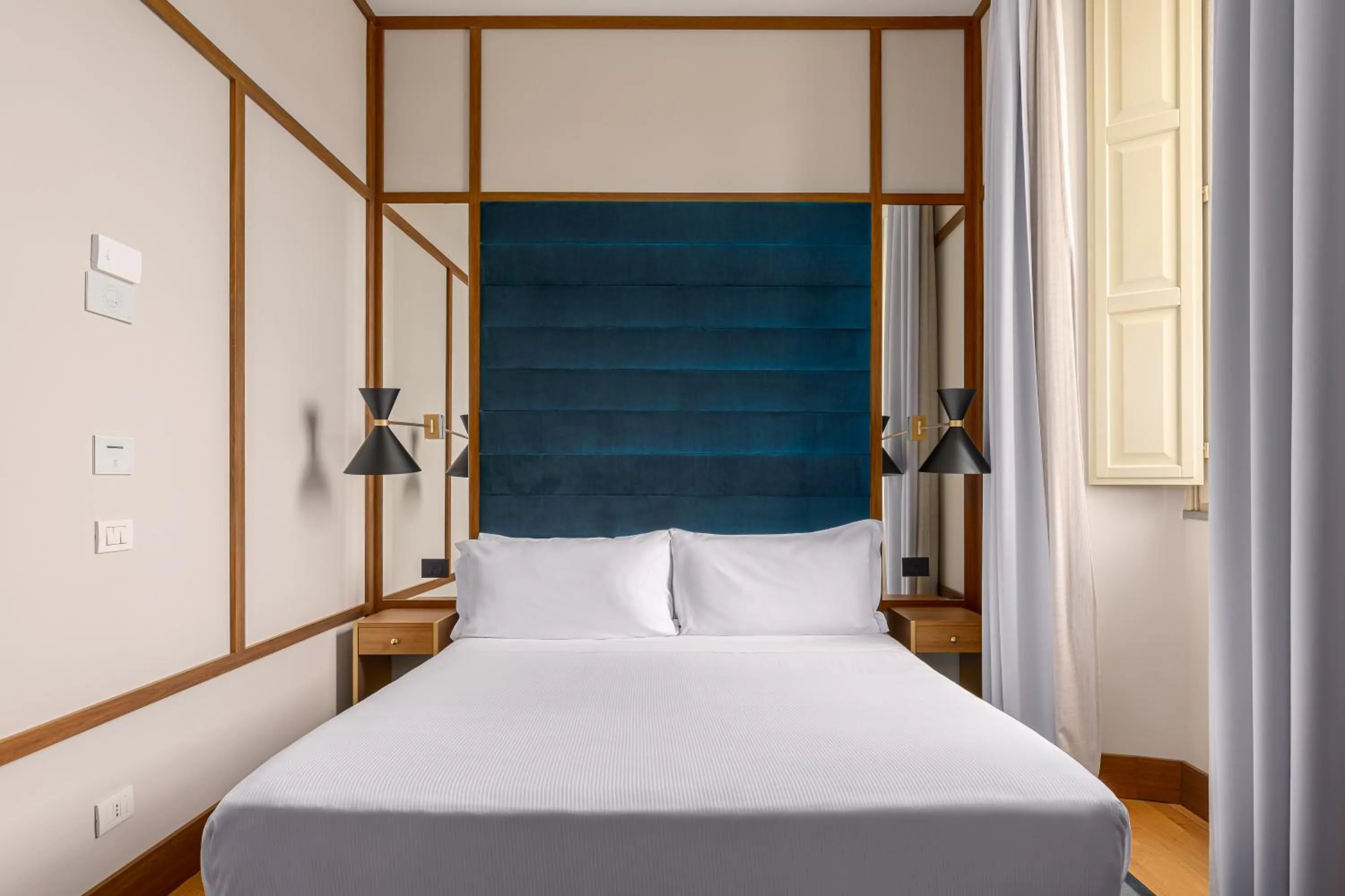 Bed in Room Mate Luca, Florence