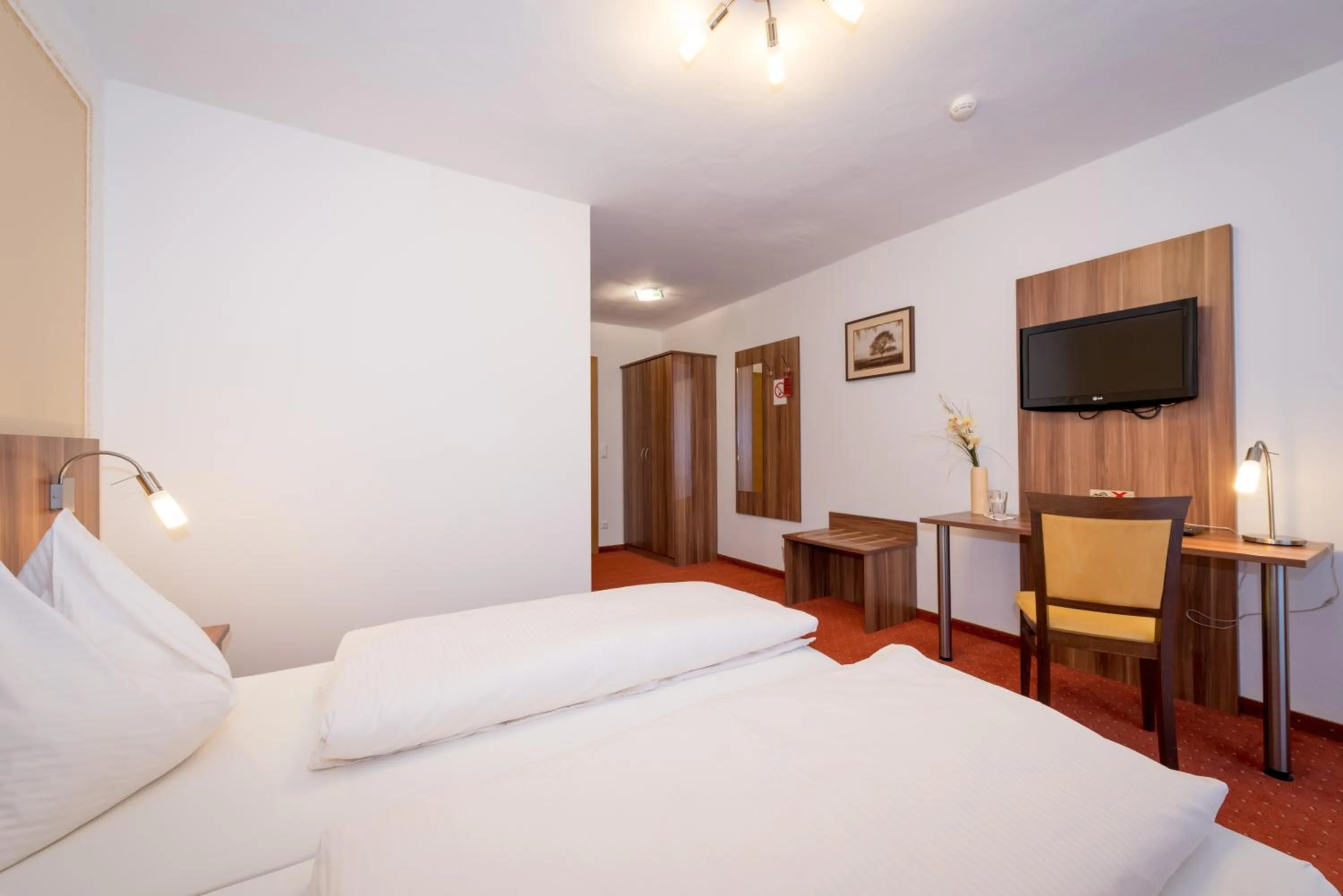 Decorative detail, Bed in Kirchenwirt Irrsdorf Familie Schinwald