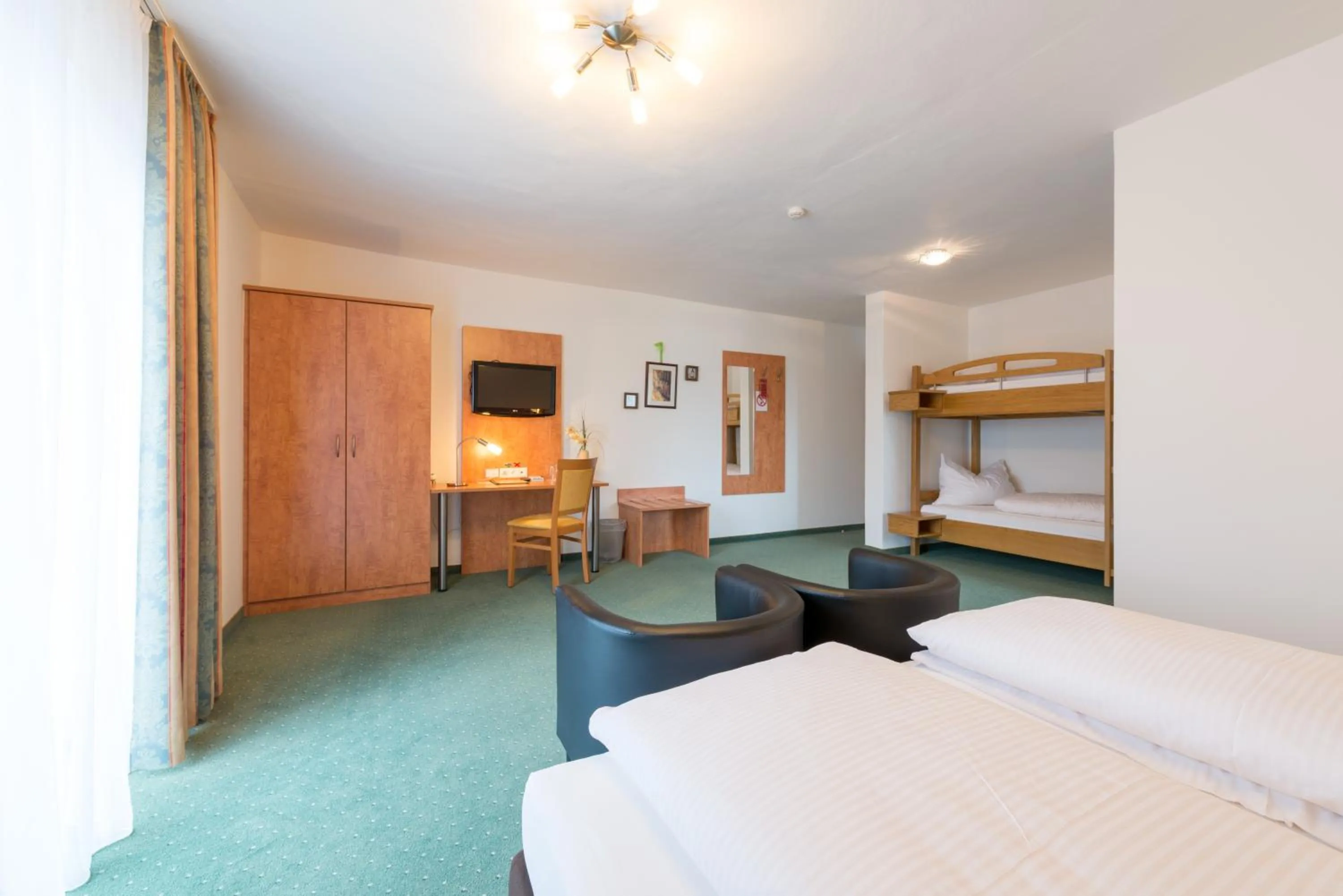 Photo of the whole room, Bed in Kirchenwirt Irrsdorf Familie Schinwald