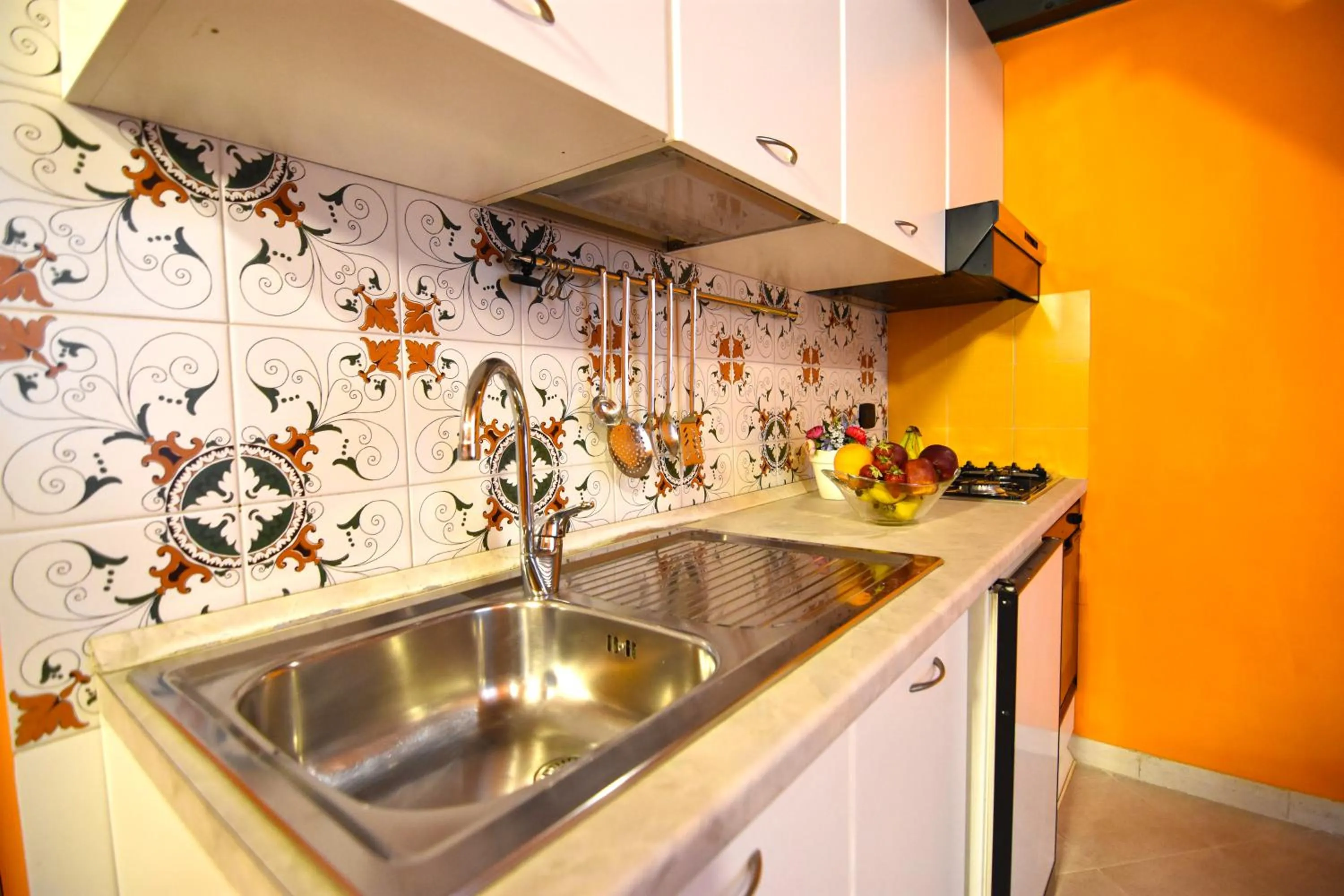 Kitchen or kitchenette in Case Così Apartments - Napoli