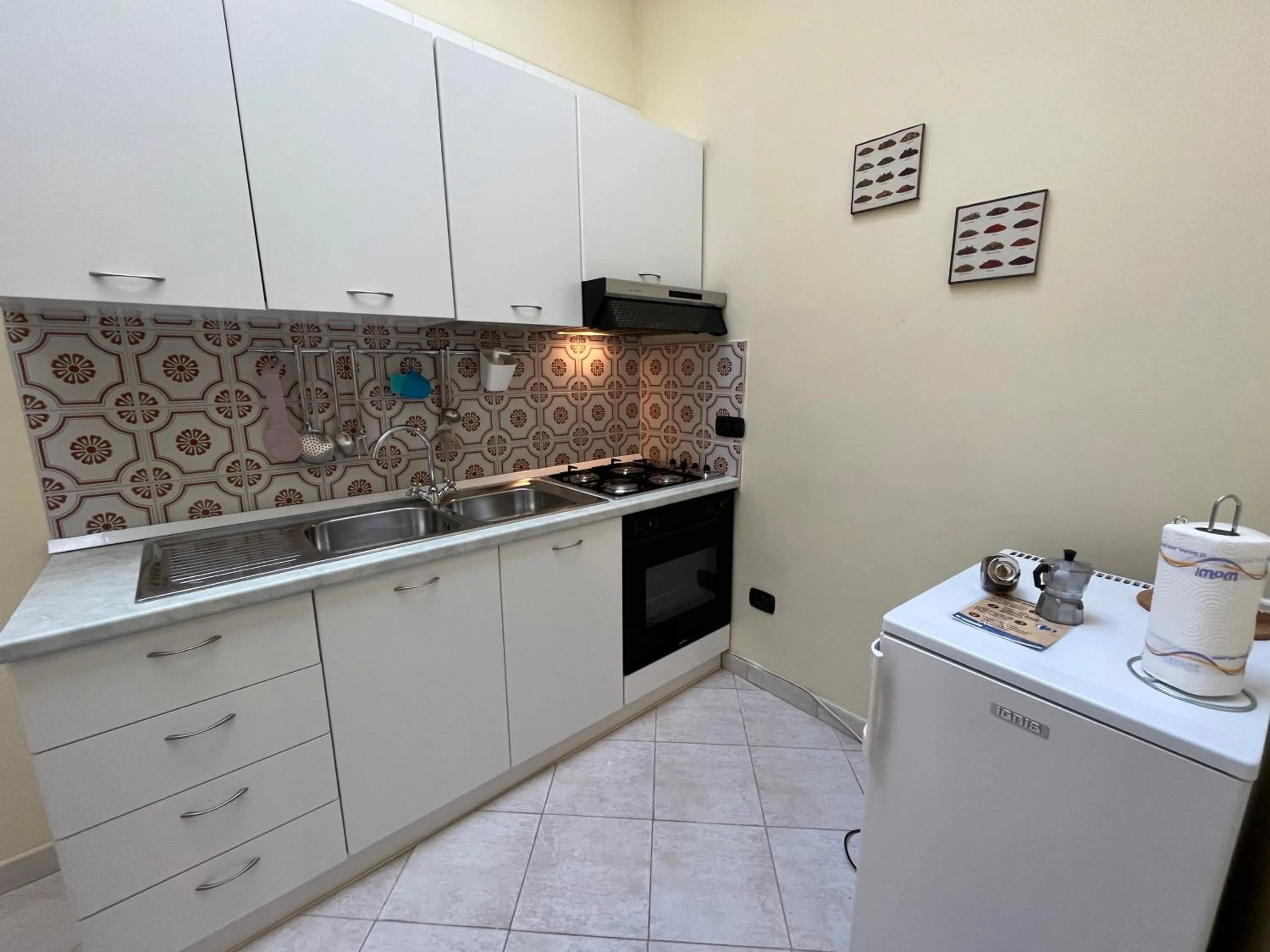 Kitchen or kitchenette in Case Così Apartments - Napoli