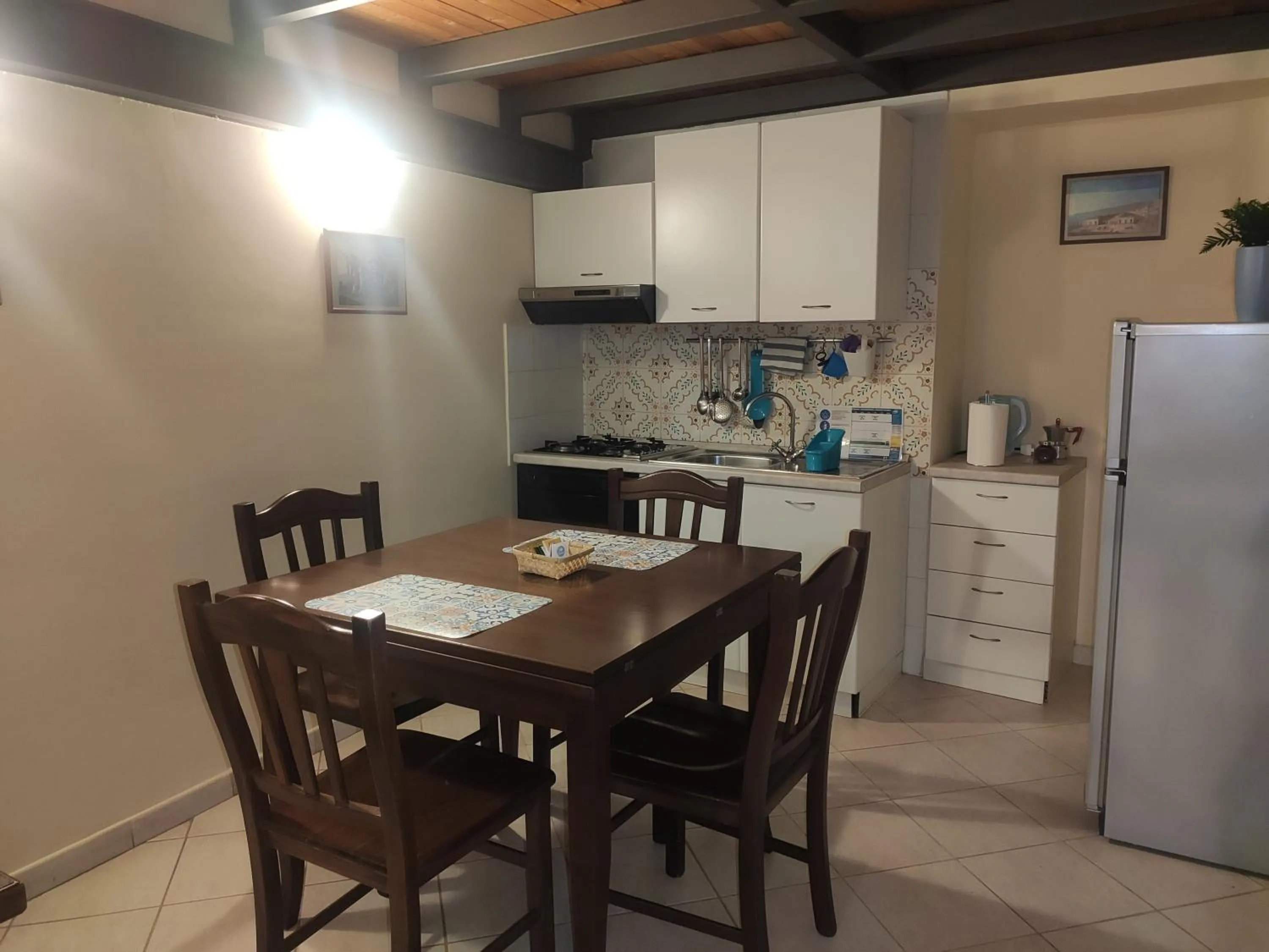 Kitchen or kitchenette in Case Così Apartments - Napoli