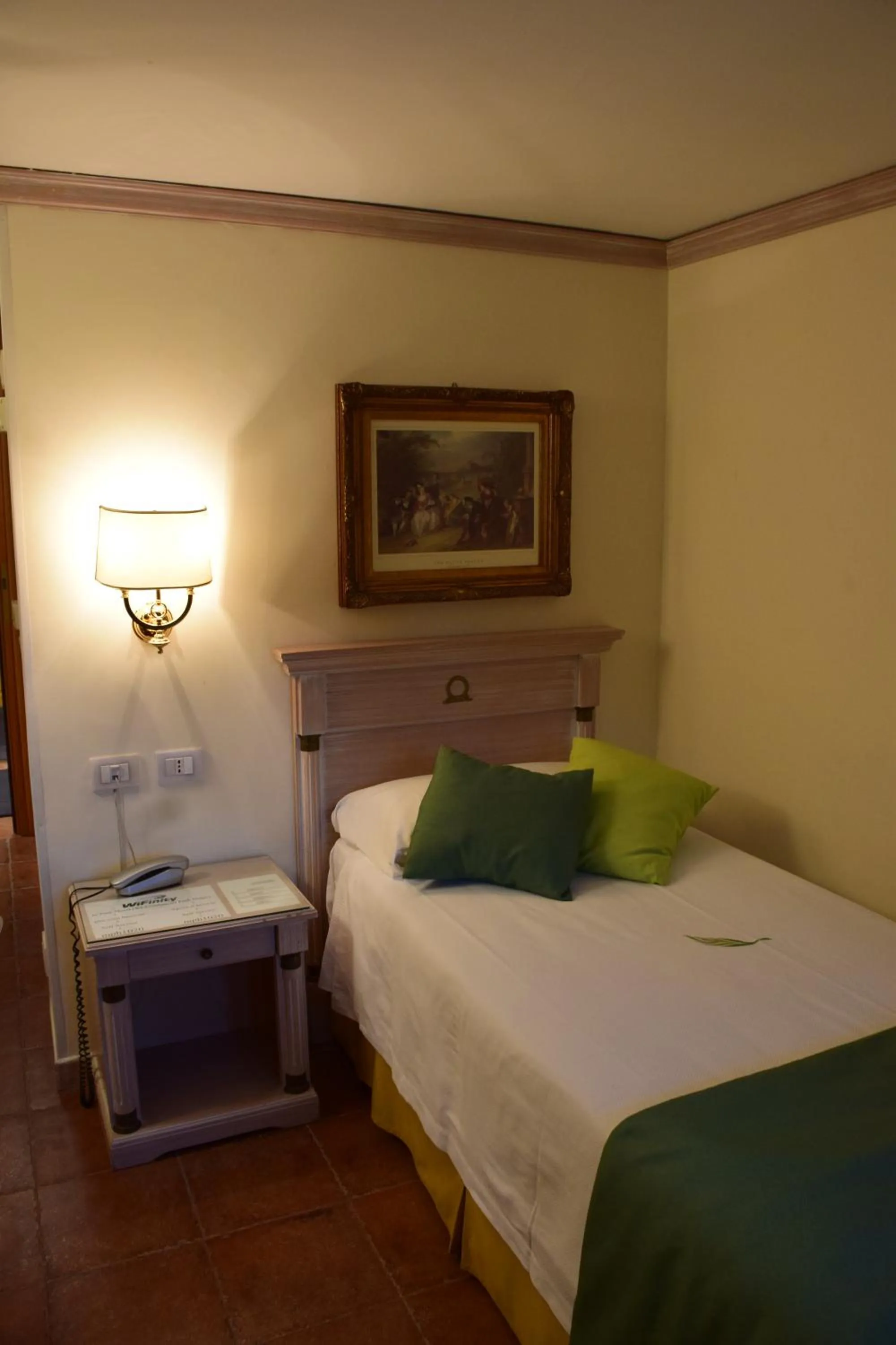 Bed in Mancini Park Hotel