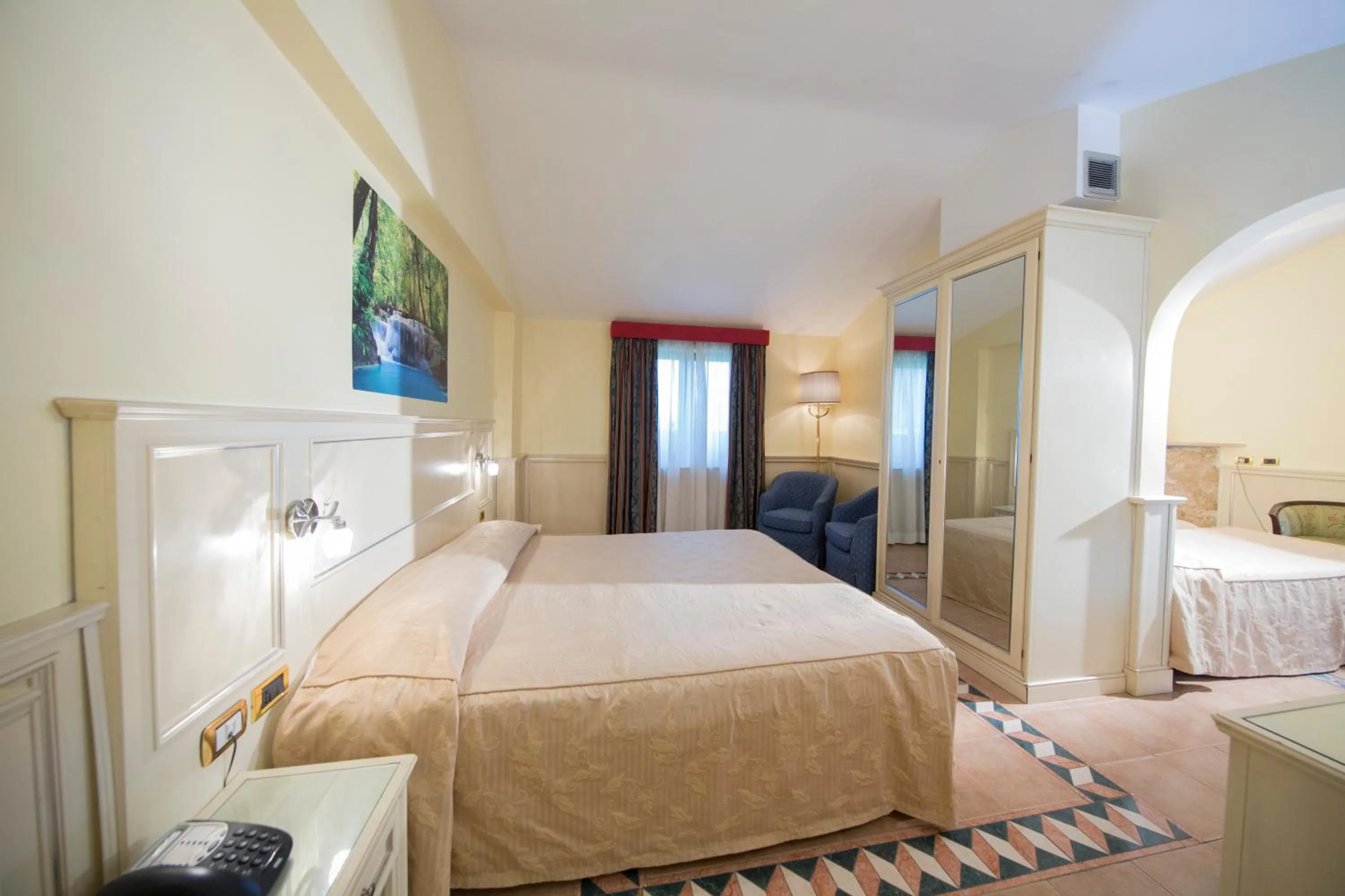 Photo of the whole room, Bed in Mancini Park Hotel