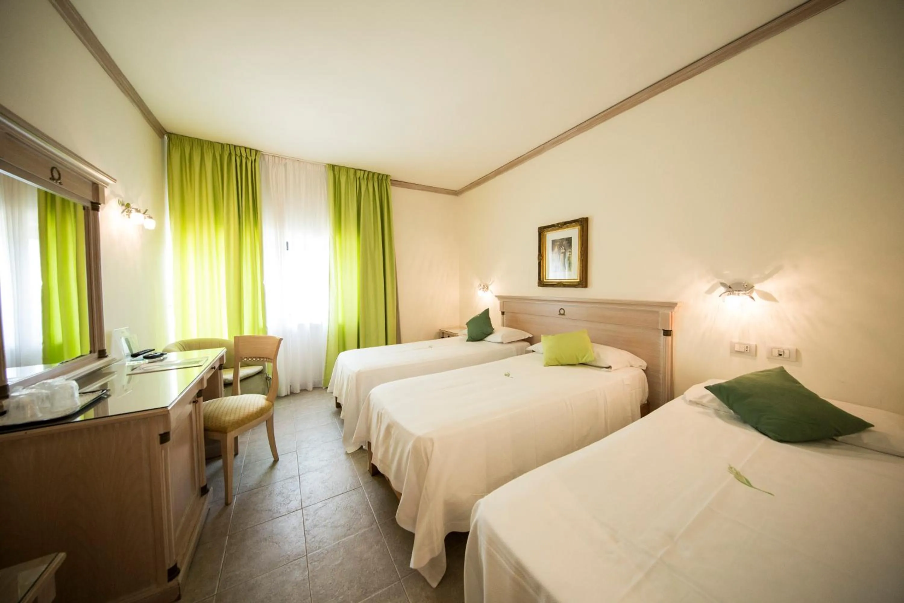 Photo of the whole room, Bed in Mancini Park Hotel