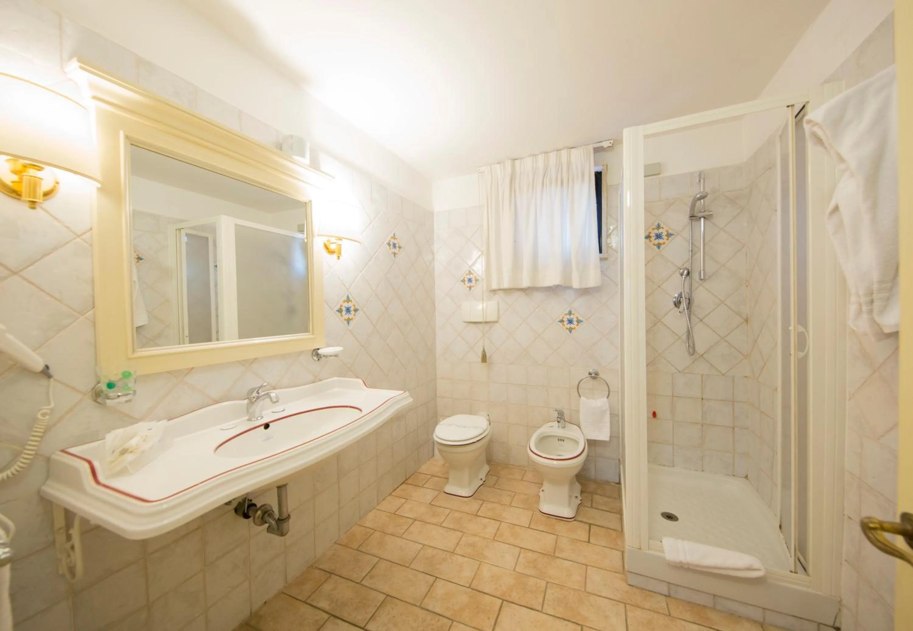 Bathroom in Mancini Park Hotel