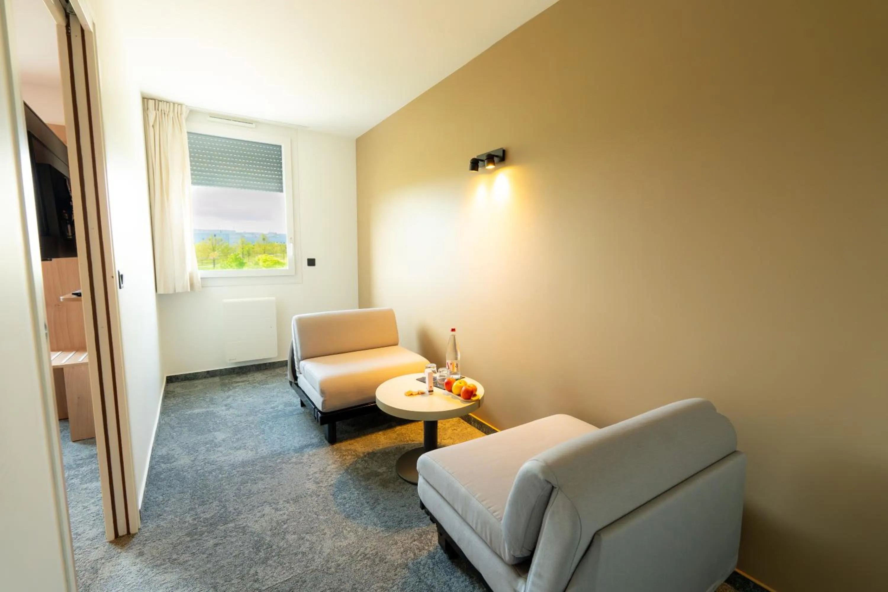 Living room in Hôtel Akena Reims Bezannes