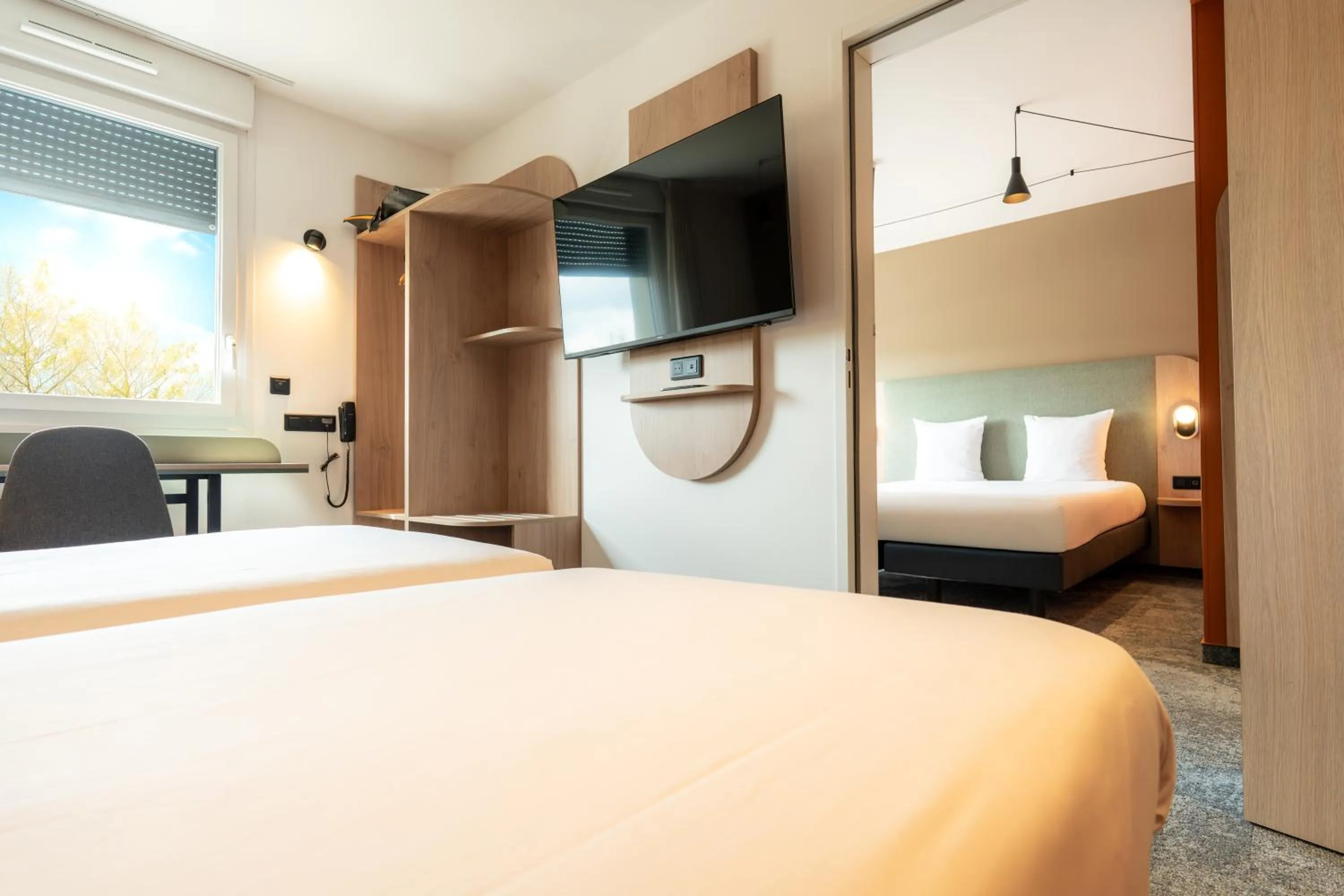 Bed in Hôtel Akena Reims Bezannes