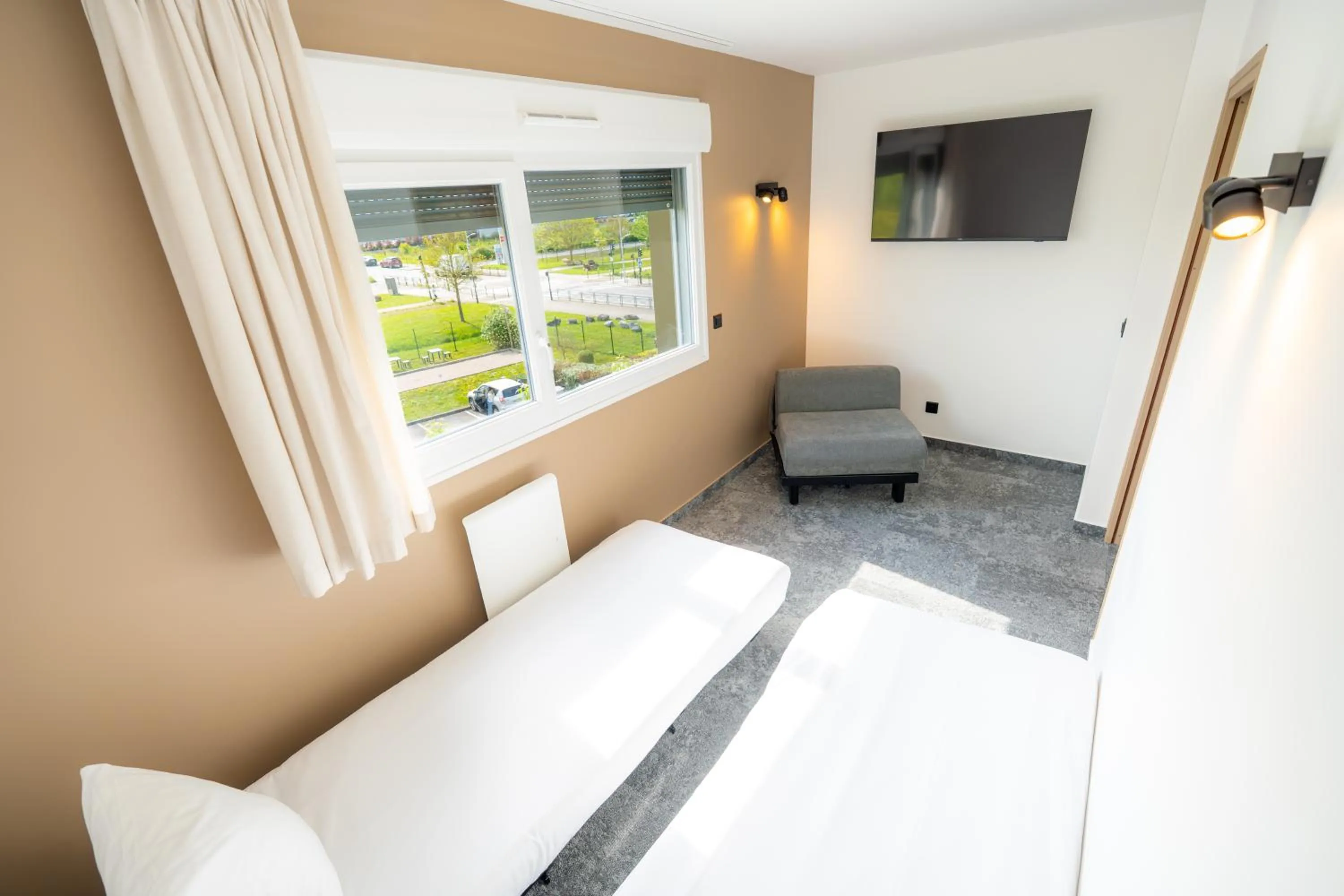 Bed in Hôtel Akena Reims Bezannes