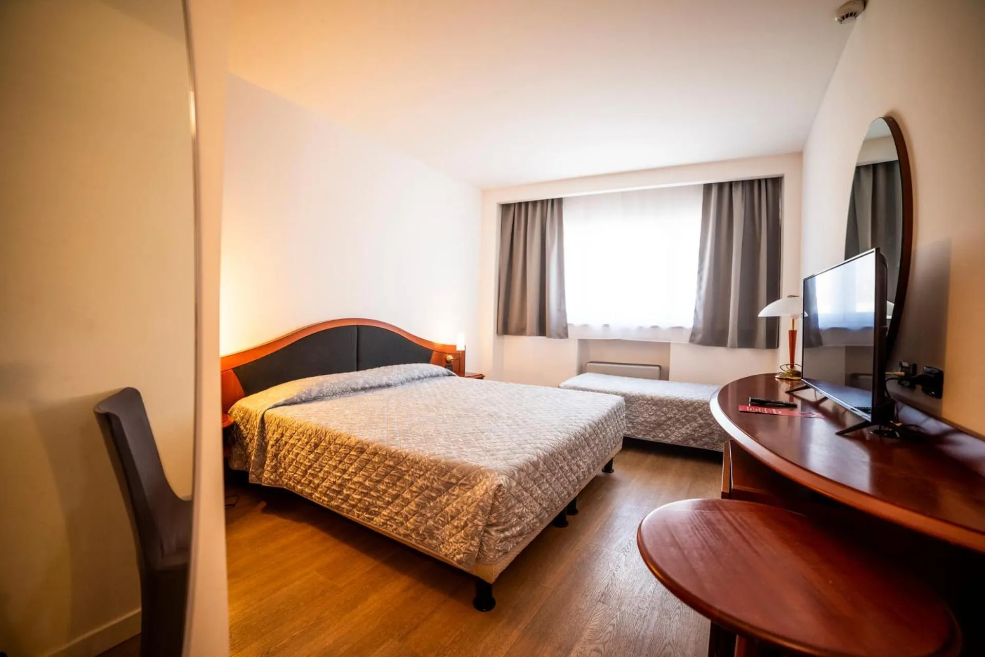 Bed in Hotel Donizetti