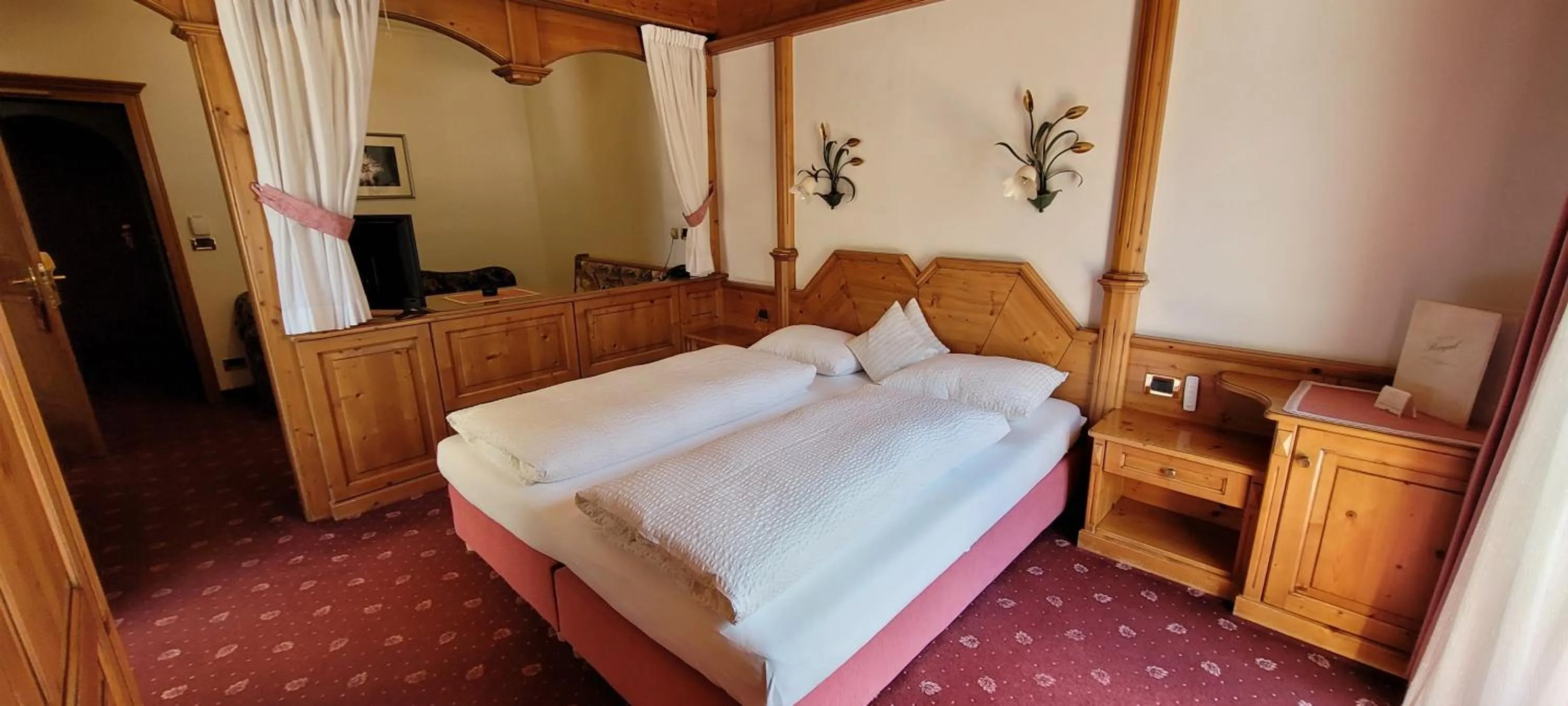 Bed in Hotel Garni Royal