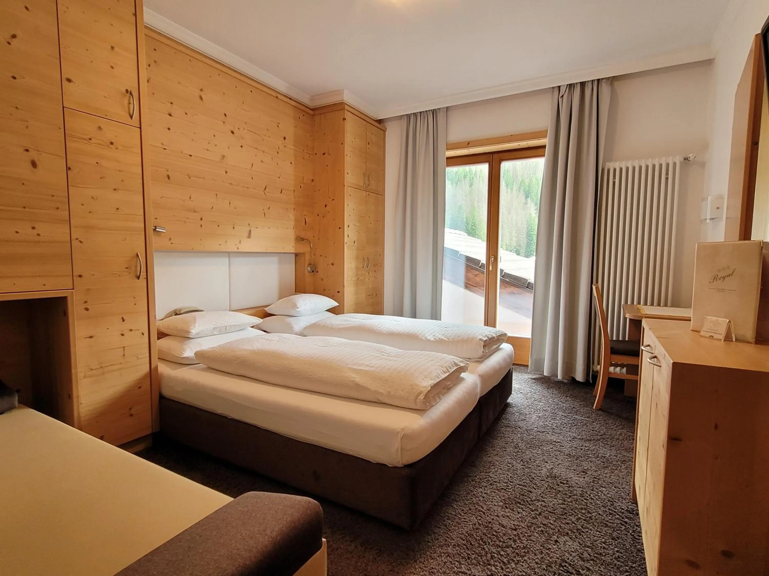 Bed in Hotel Garni Royal