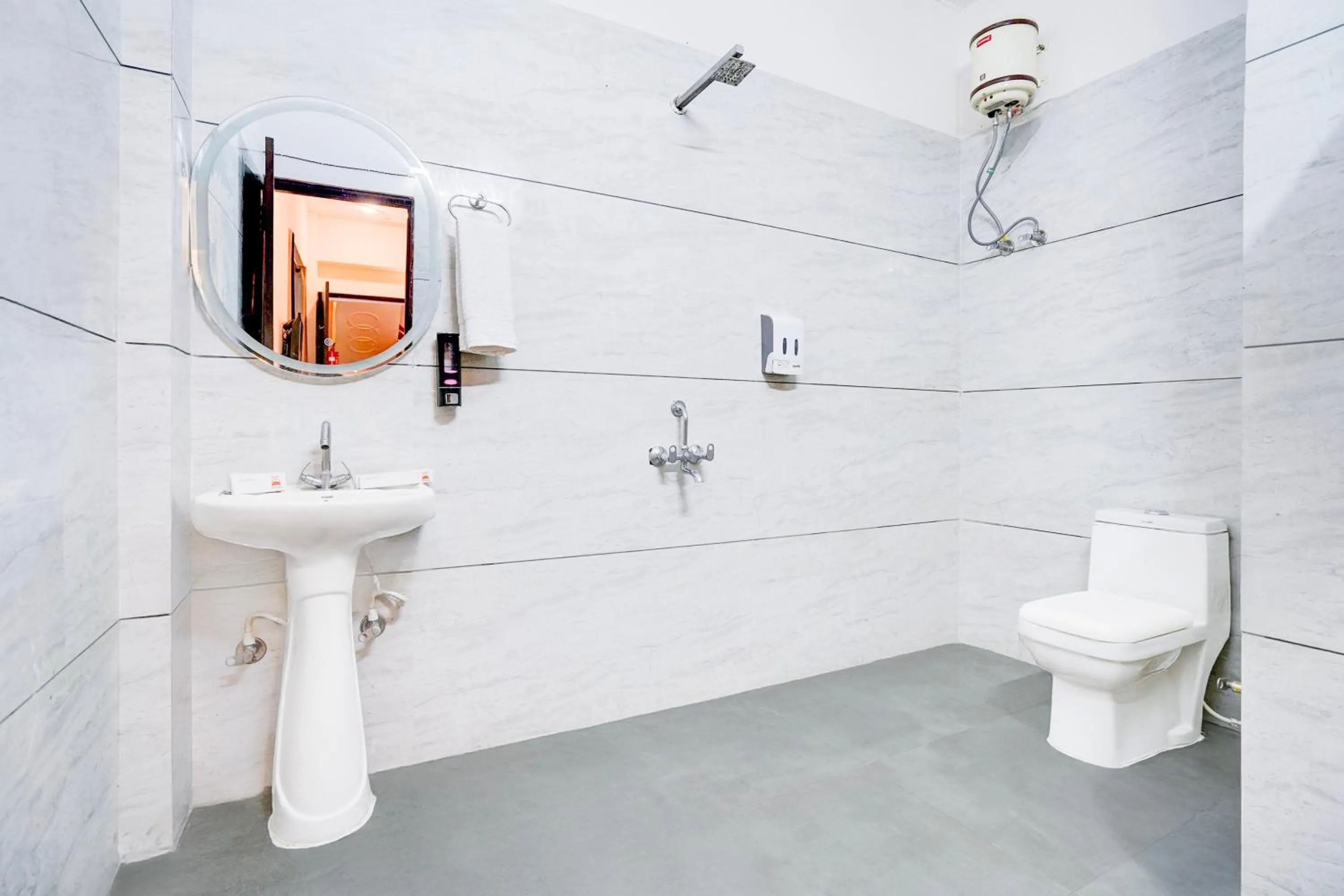 Bathroom in Pinaki Hotels & Resorts