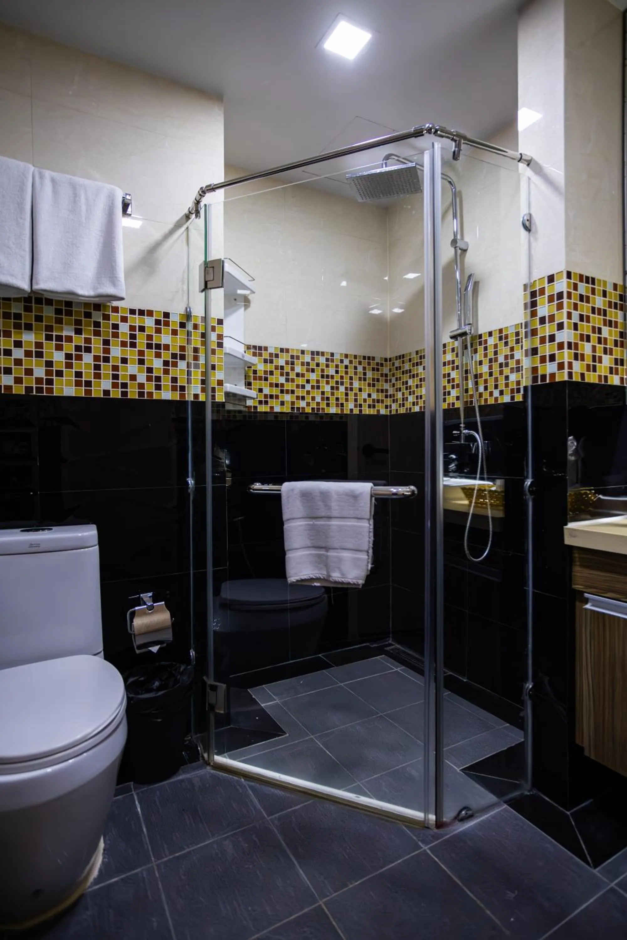 Shower in Ramada by Wyndham Bangkok Ten Ekamai Residences