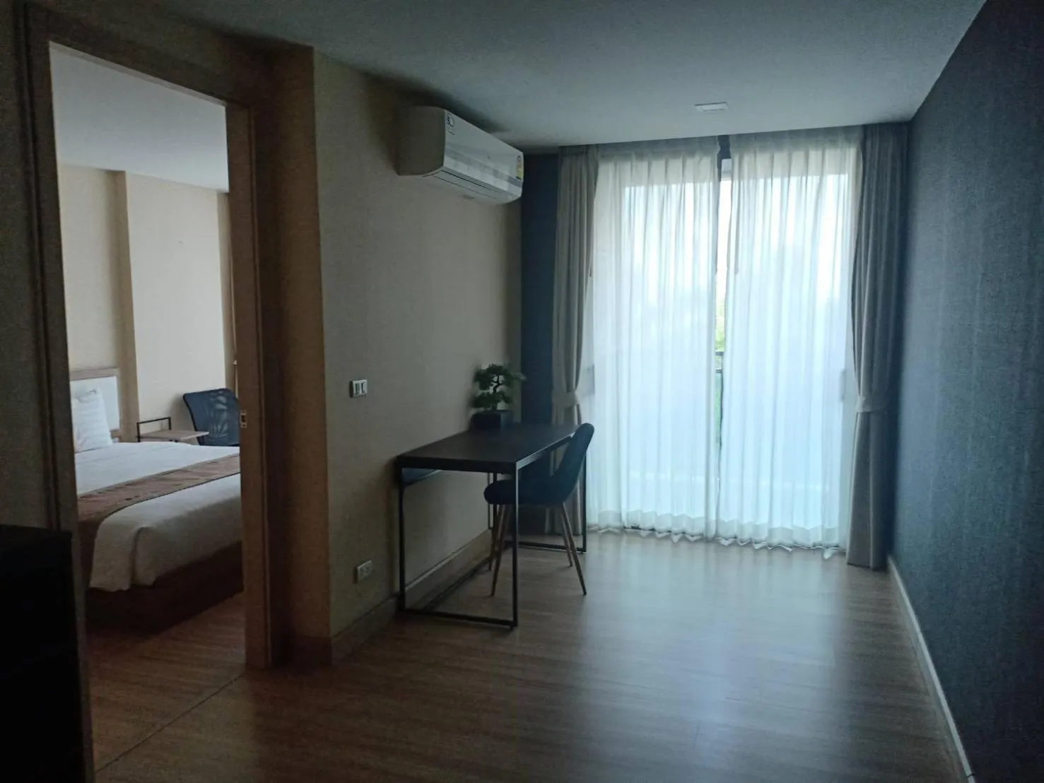 Seating area, Bed in Ramada by Wyndham Bangkok Ten Ekamai Residences