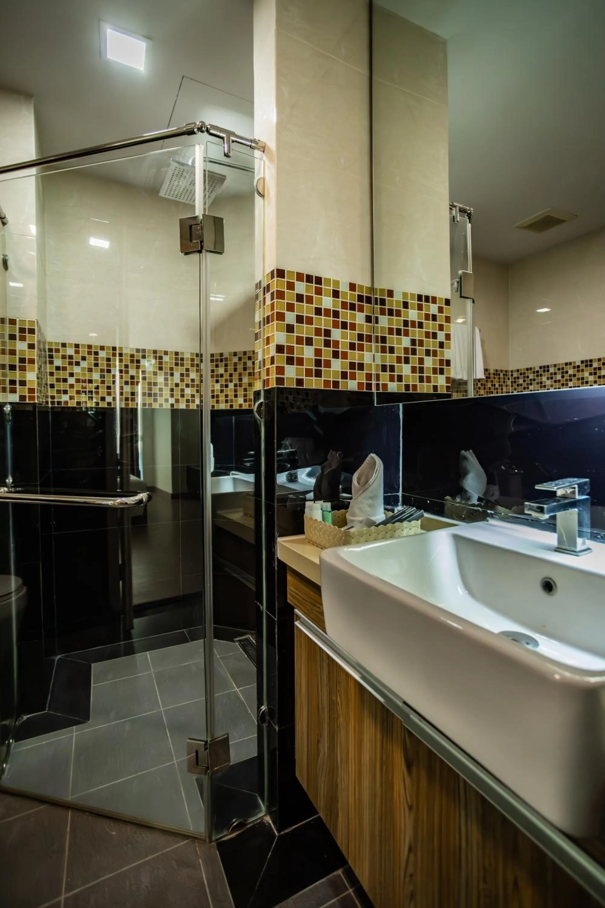 Shower in Ramada by Wyndham Bangkok Ten Ekamai Residences