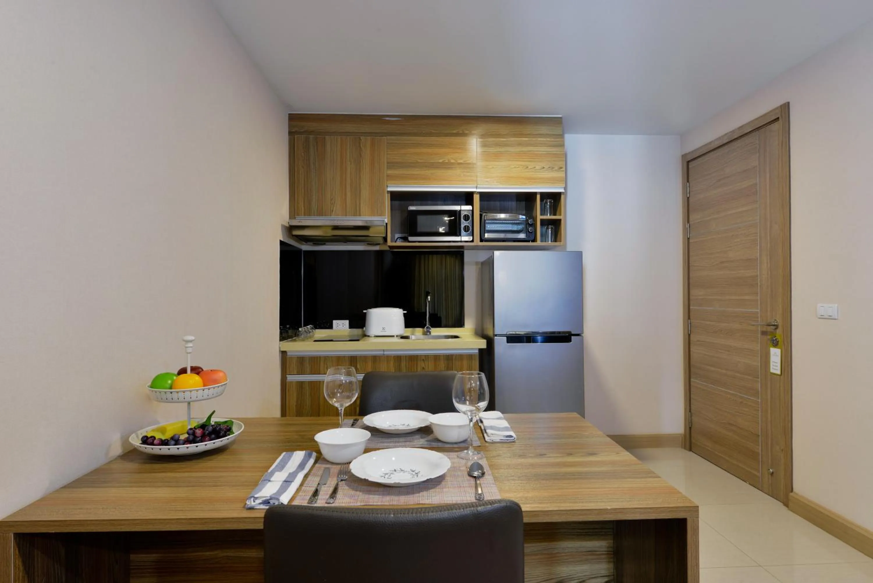 Kitchen or kitchenette in Ramada by Wyndham Bangkok Ten Ekamai Residences