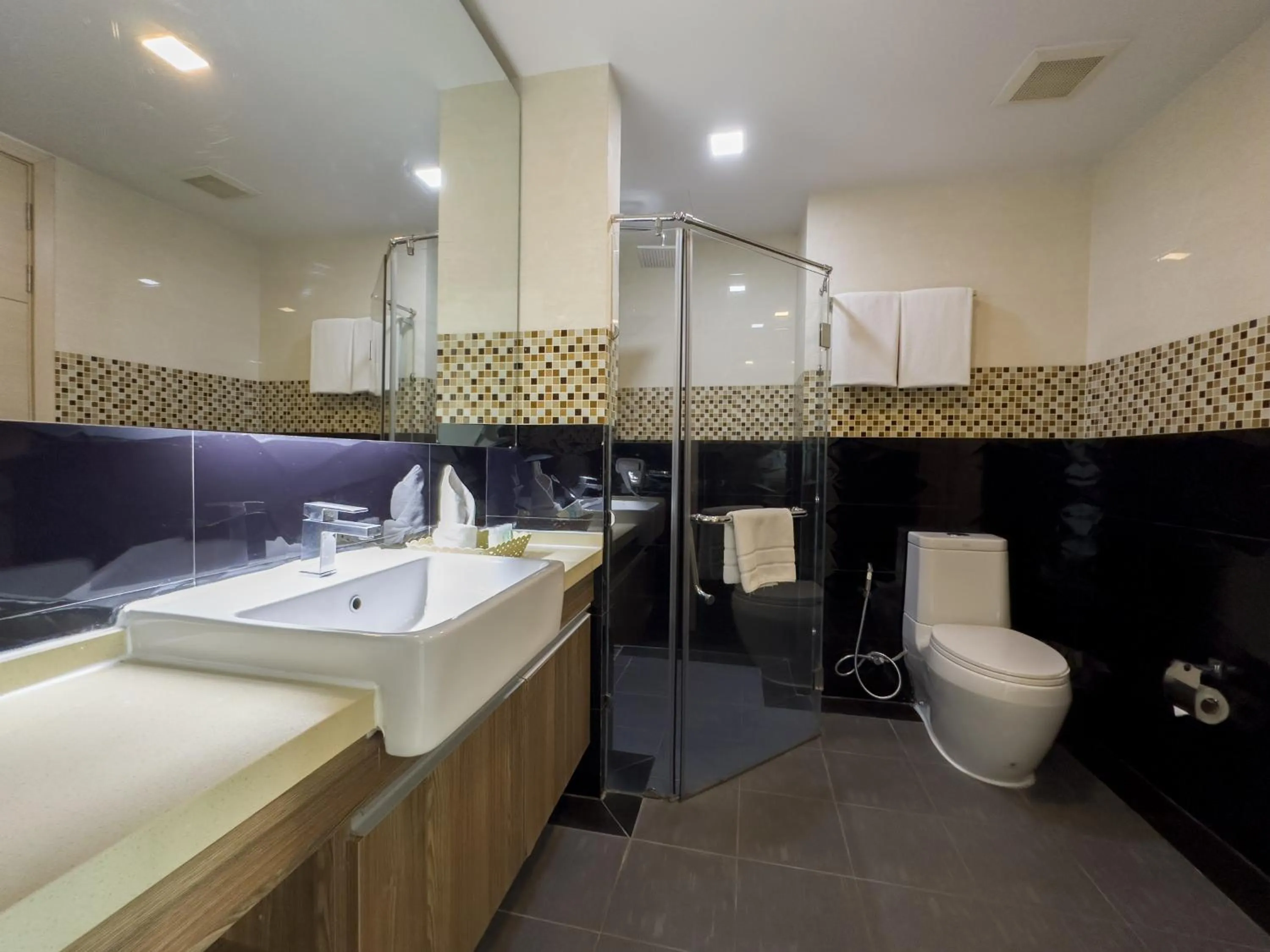 Bathroom in Ramada by Wyndham Bangkok Ten Ekamai Residences