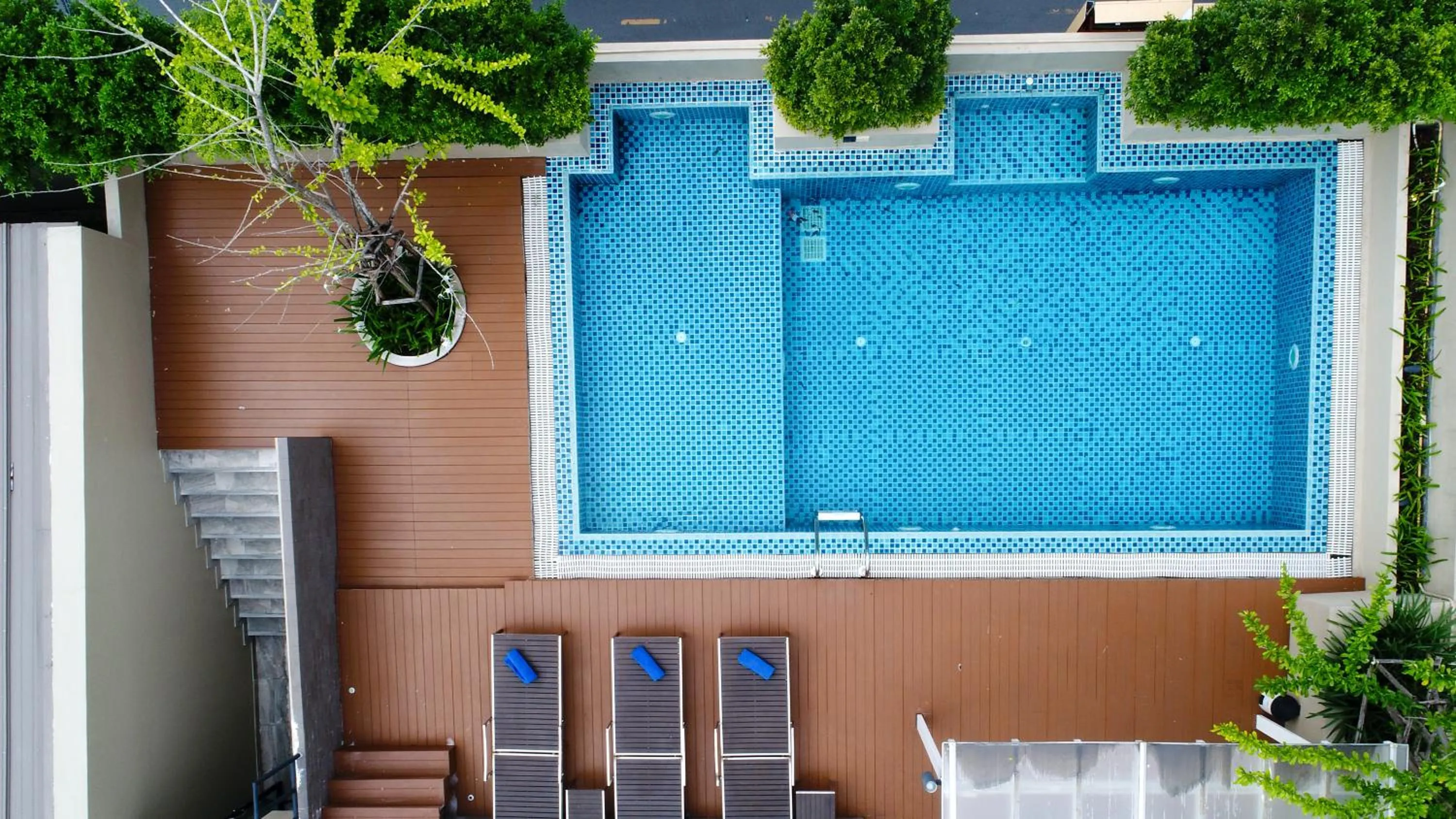 Swimming pool in Ramada by Wyndham Bangkok Ten Ekamai Residences