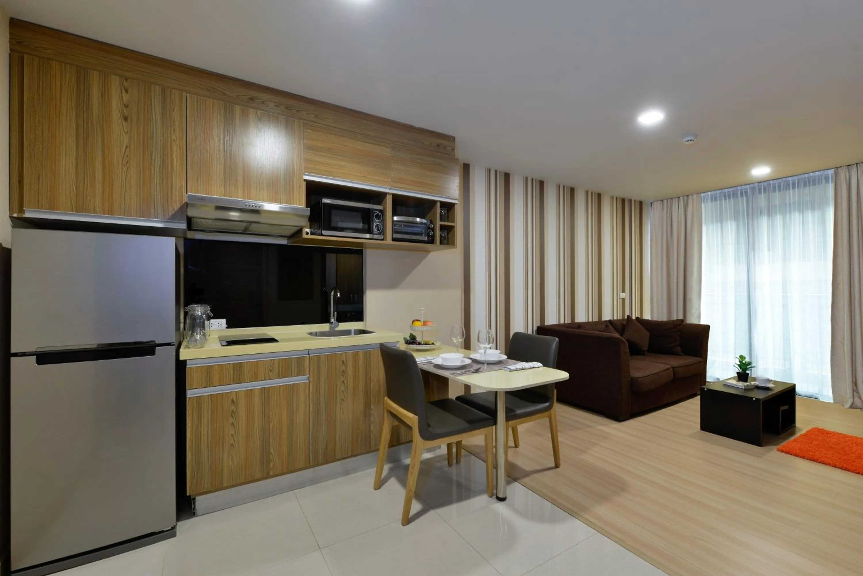 Kitchen or kitchenette in Ramada by Wyndham Bangkok Ten Ekamai Residences