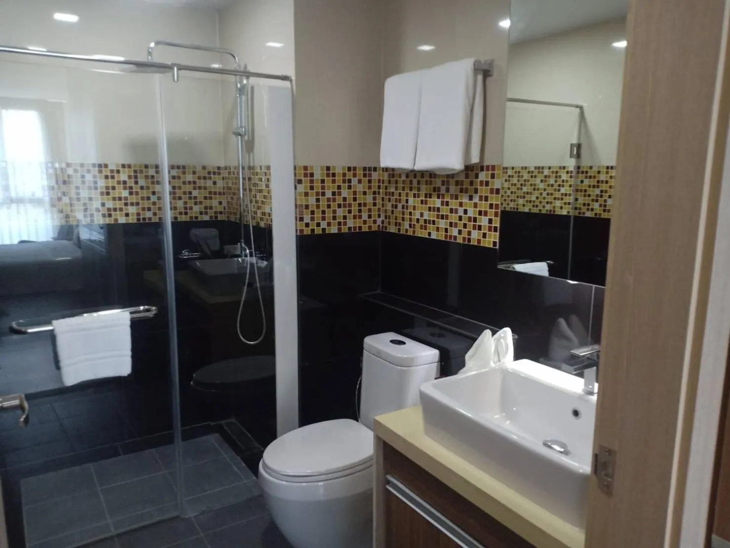 Shower in Ramada by Wyndham Bangkok Ten Ekamai Residences