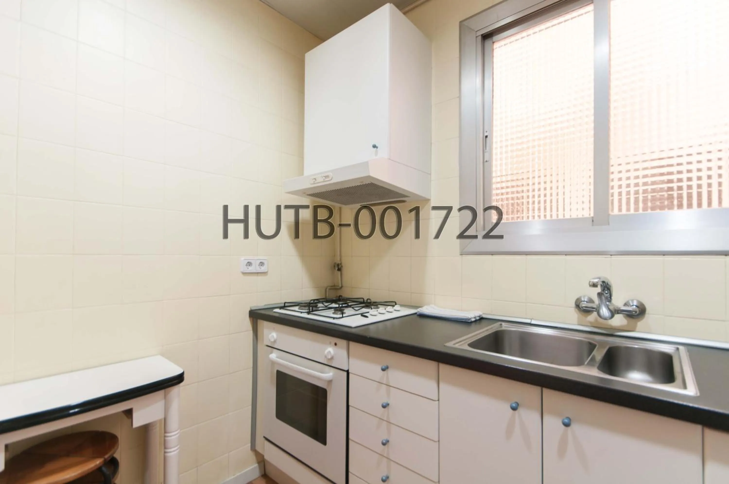 Kitchen or kitchenette in Go-BCN Residence Sagrada Familia