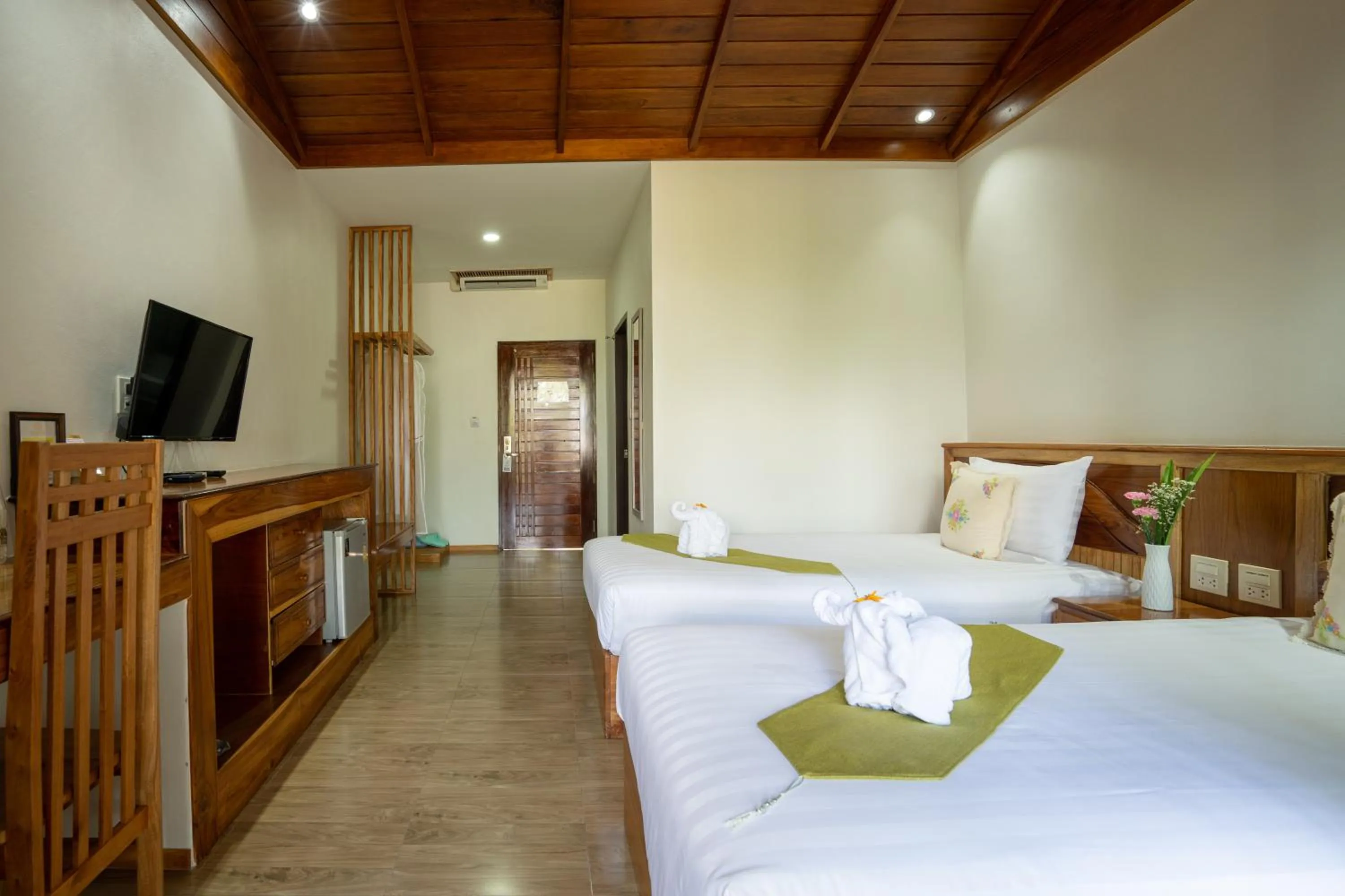 Bed in Merry Spa & Resort