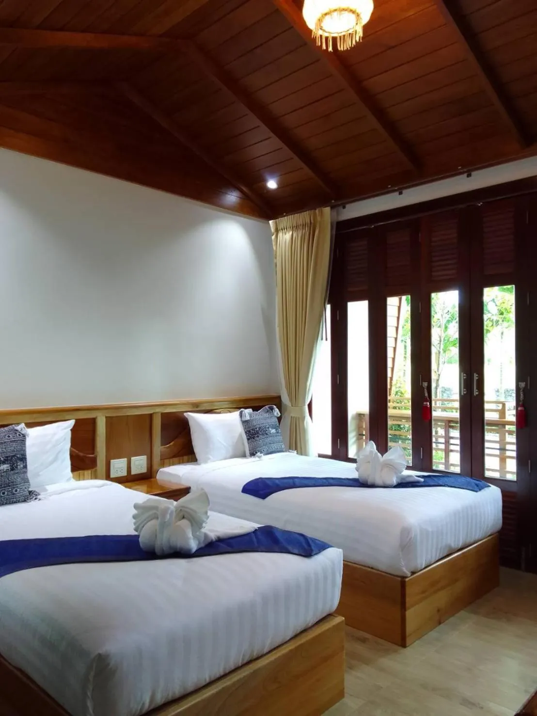 Bed in Merry Spa & Resort