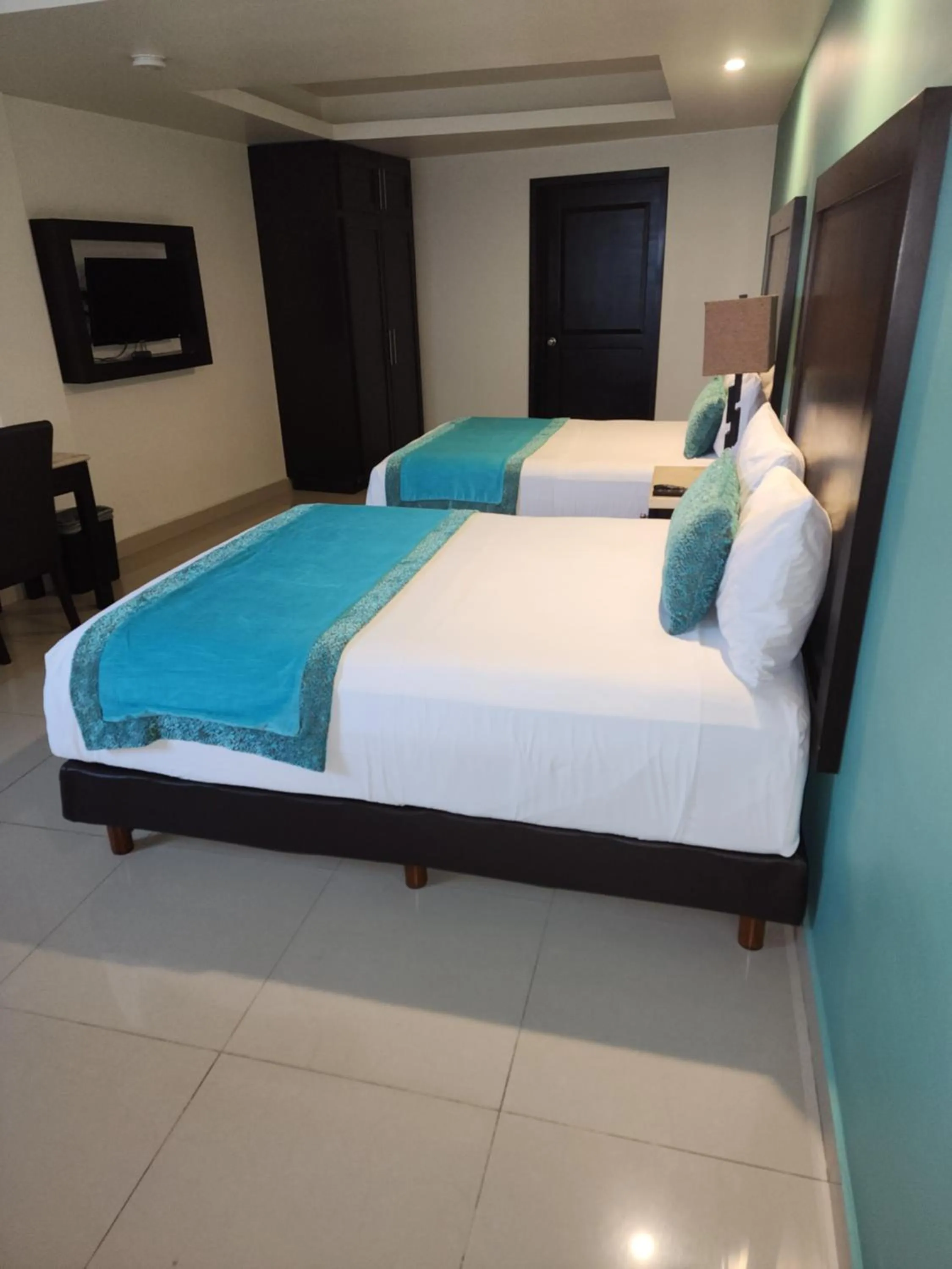 Photo of the whole room, Bed in Hotel Maria Elena