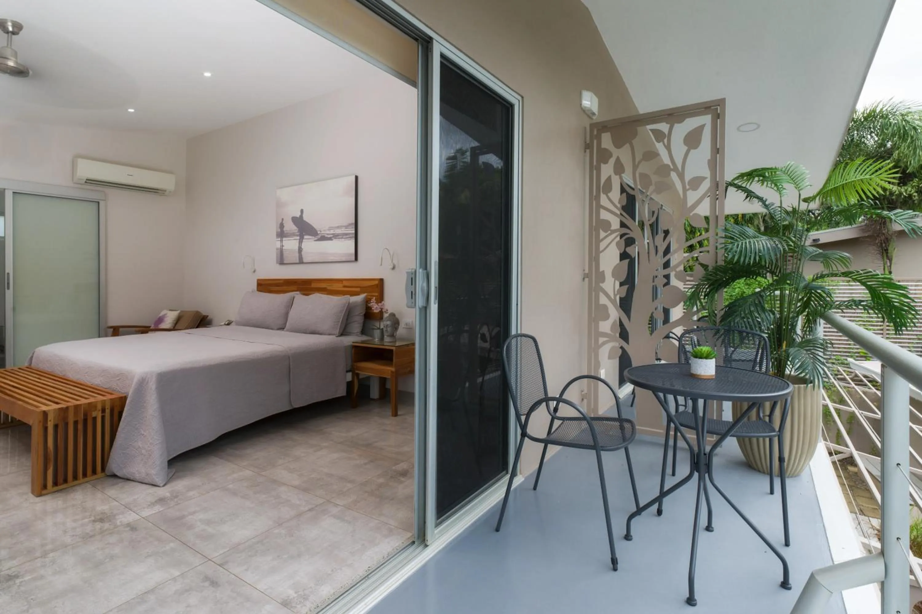 Balcony/Terrace, Bed in Tamarindo Bay Boutique Hotel, Apartments & Suites