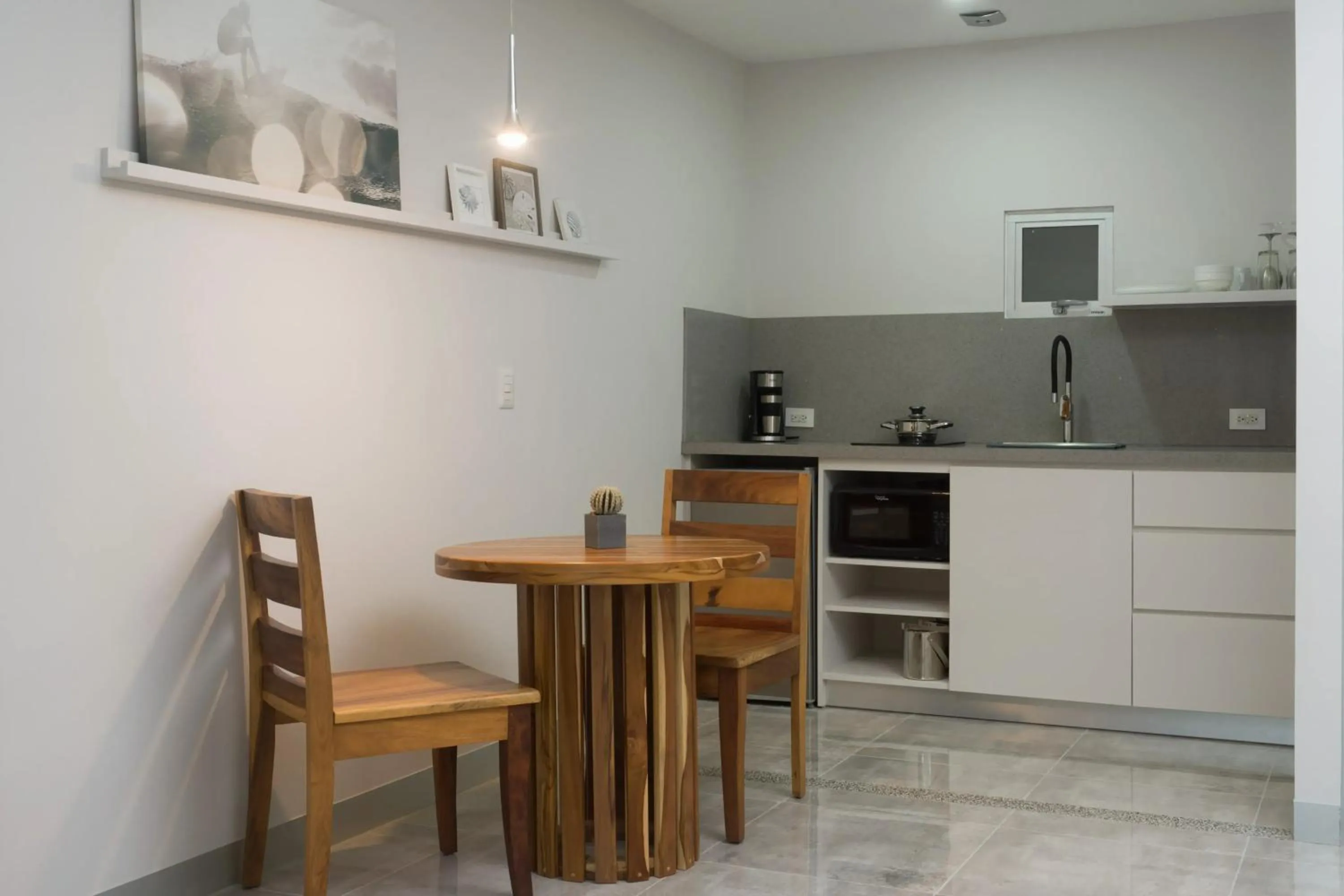 Kitchen or kitchenette in Tamarindo Bay Boutique Hotel, Apartments & Suites