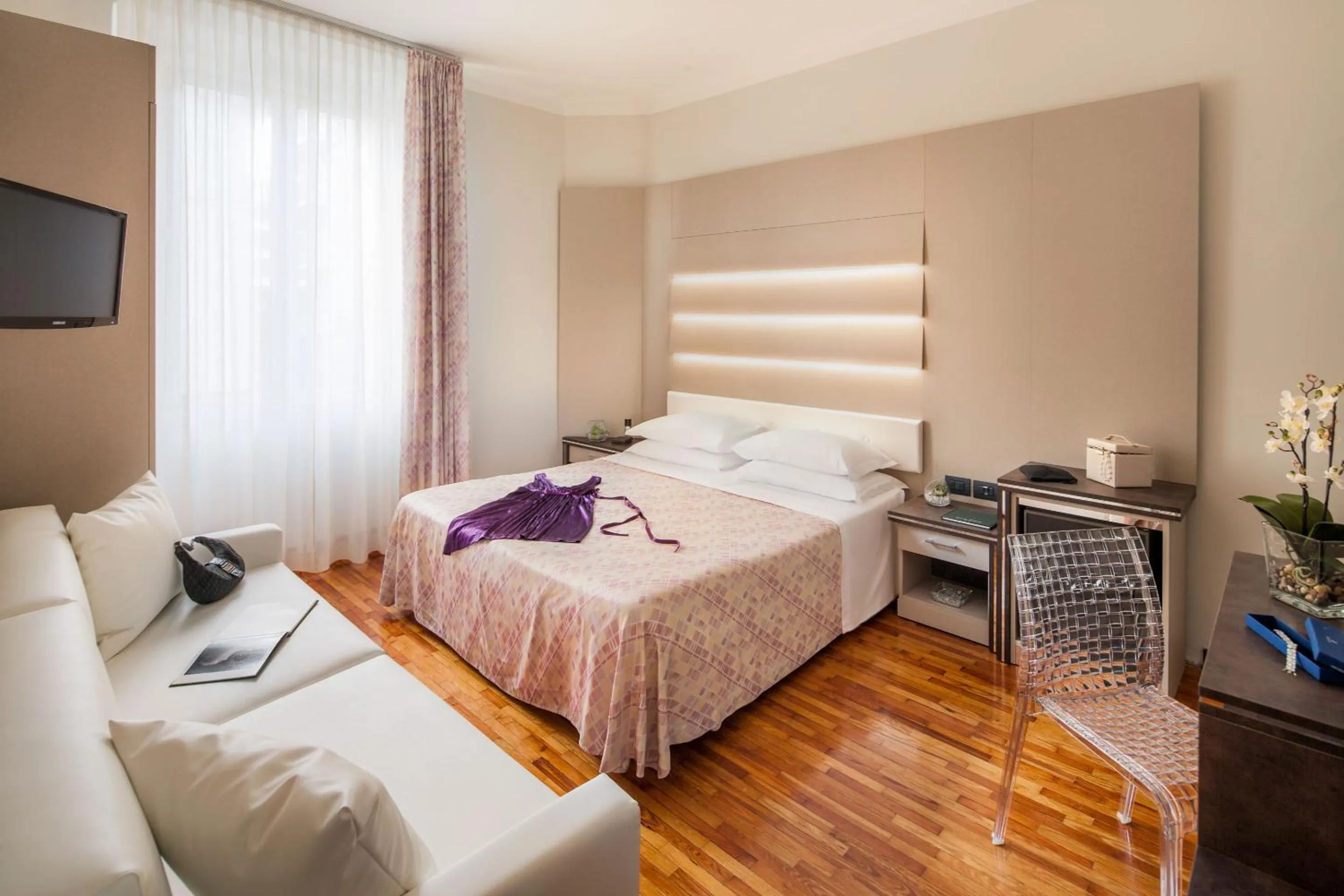 Bed in Hotel Riviera