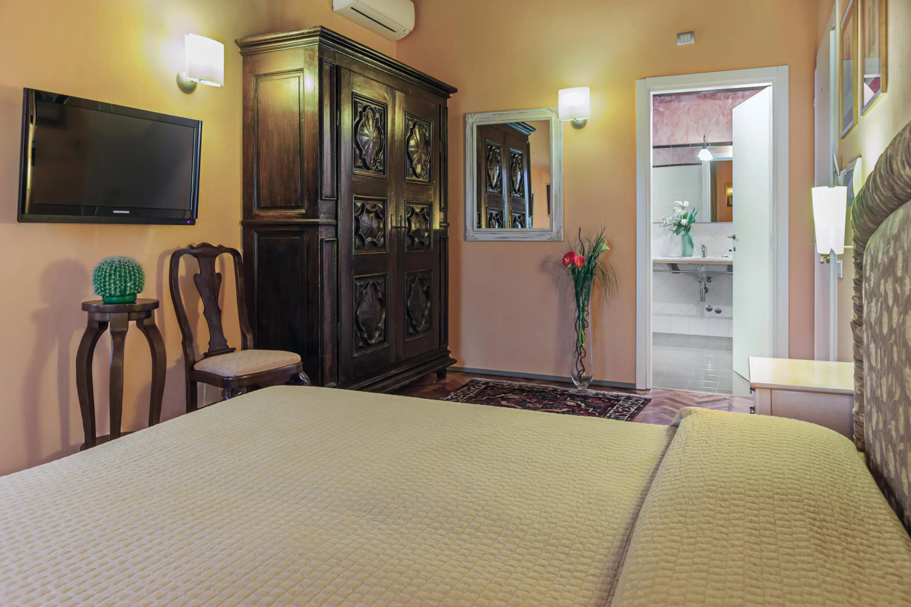 Bedroom in Hotel Villa Volpi