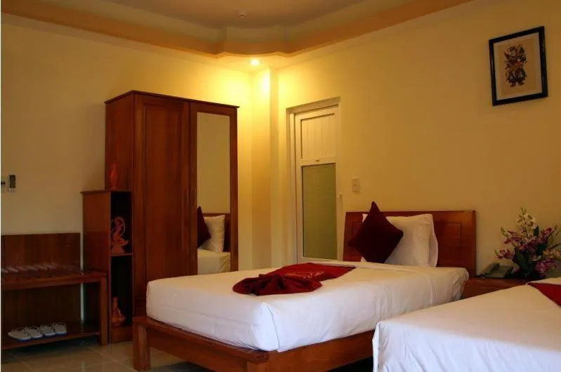Bed in Ha Phuong Mui Ne Hotel