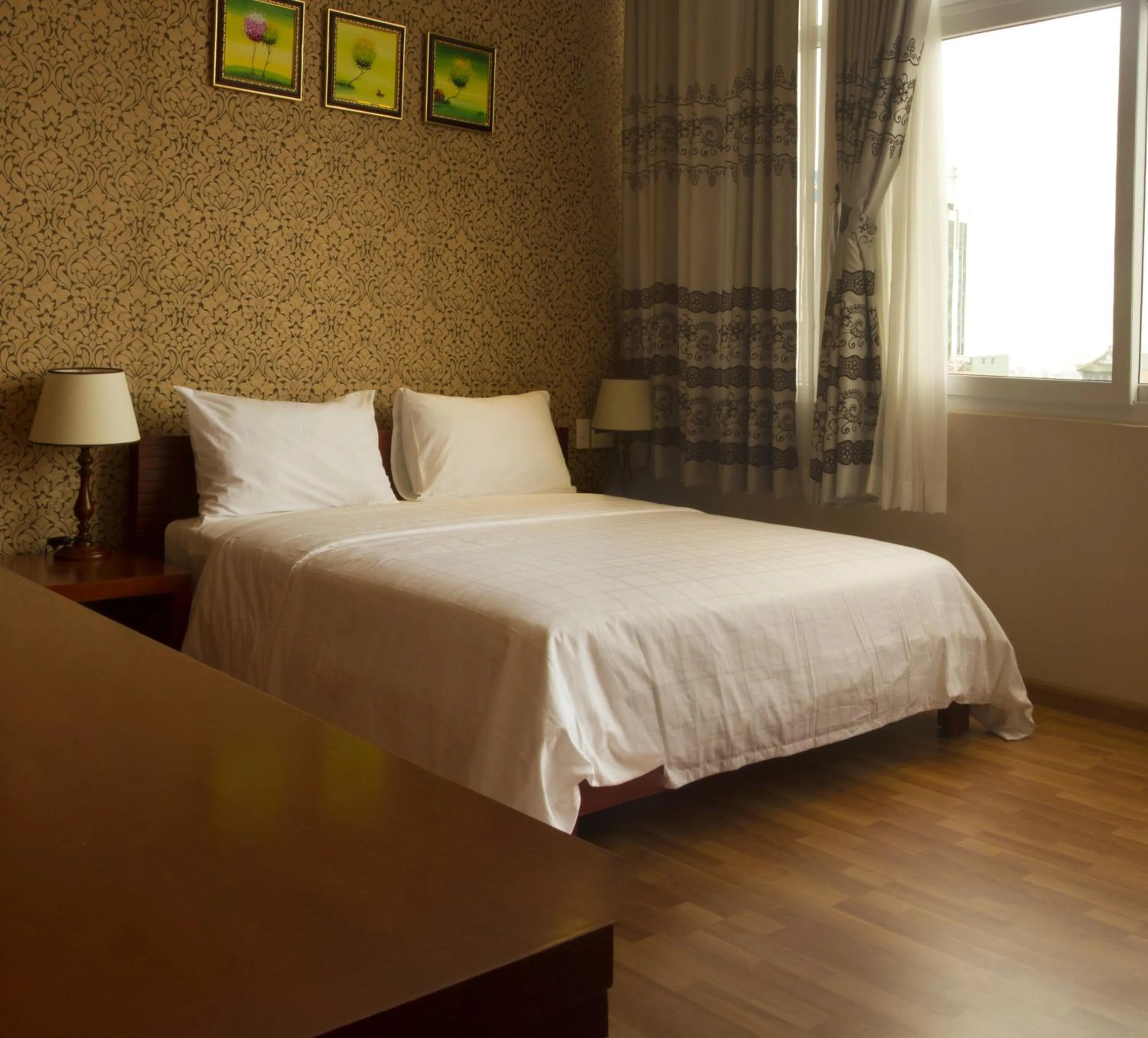 Photo of the whole room, Bed in Anh Dao Mekong Hotel