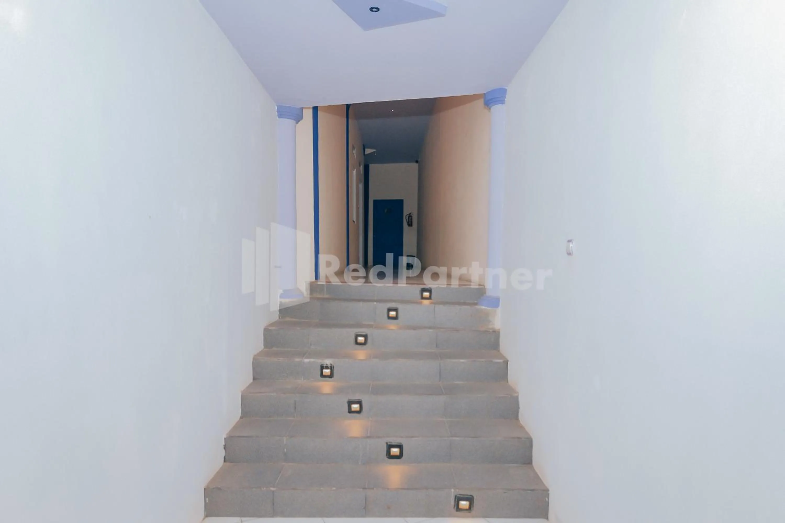 Facade/entrance in Ungu Kangen Hotel Bogor Mitra RedDoorz