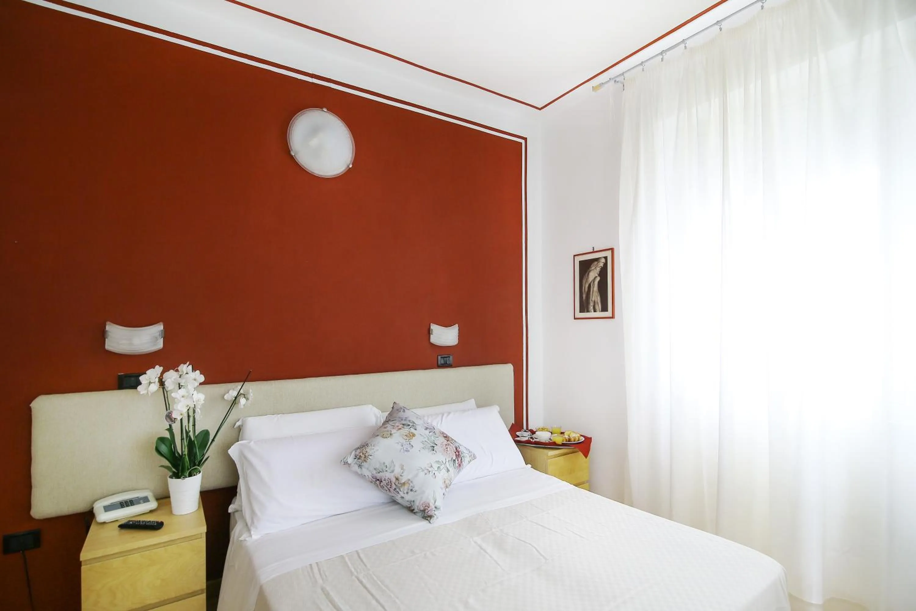 Bed in Hotel Paradiso